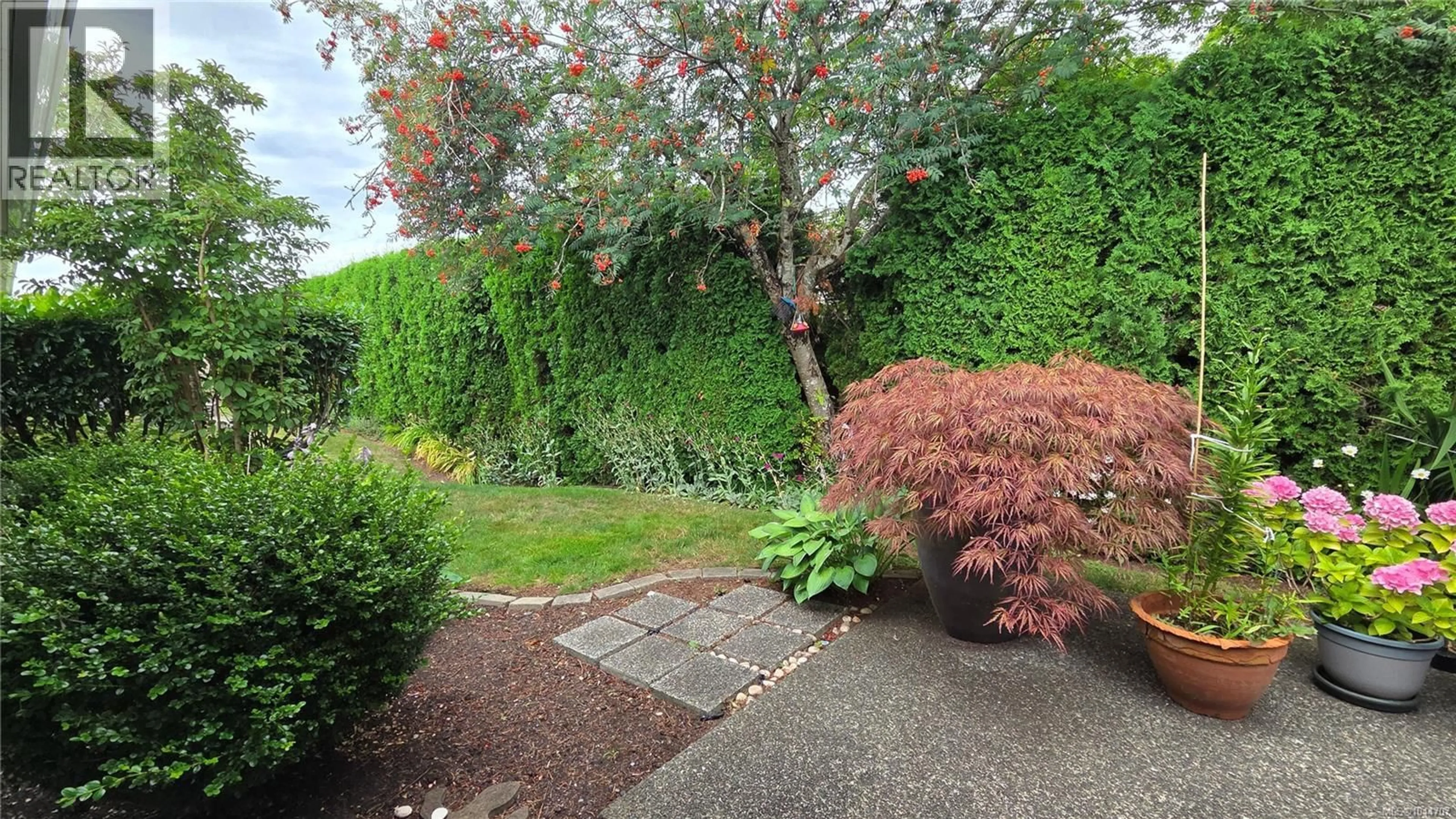 A pic from outside/outdoor area/front of a property/back of a property/a pic from drone, street for 129 - 1919 ST. ANDREWS PLACE, Courtenay British Columbia V9N9J4