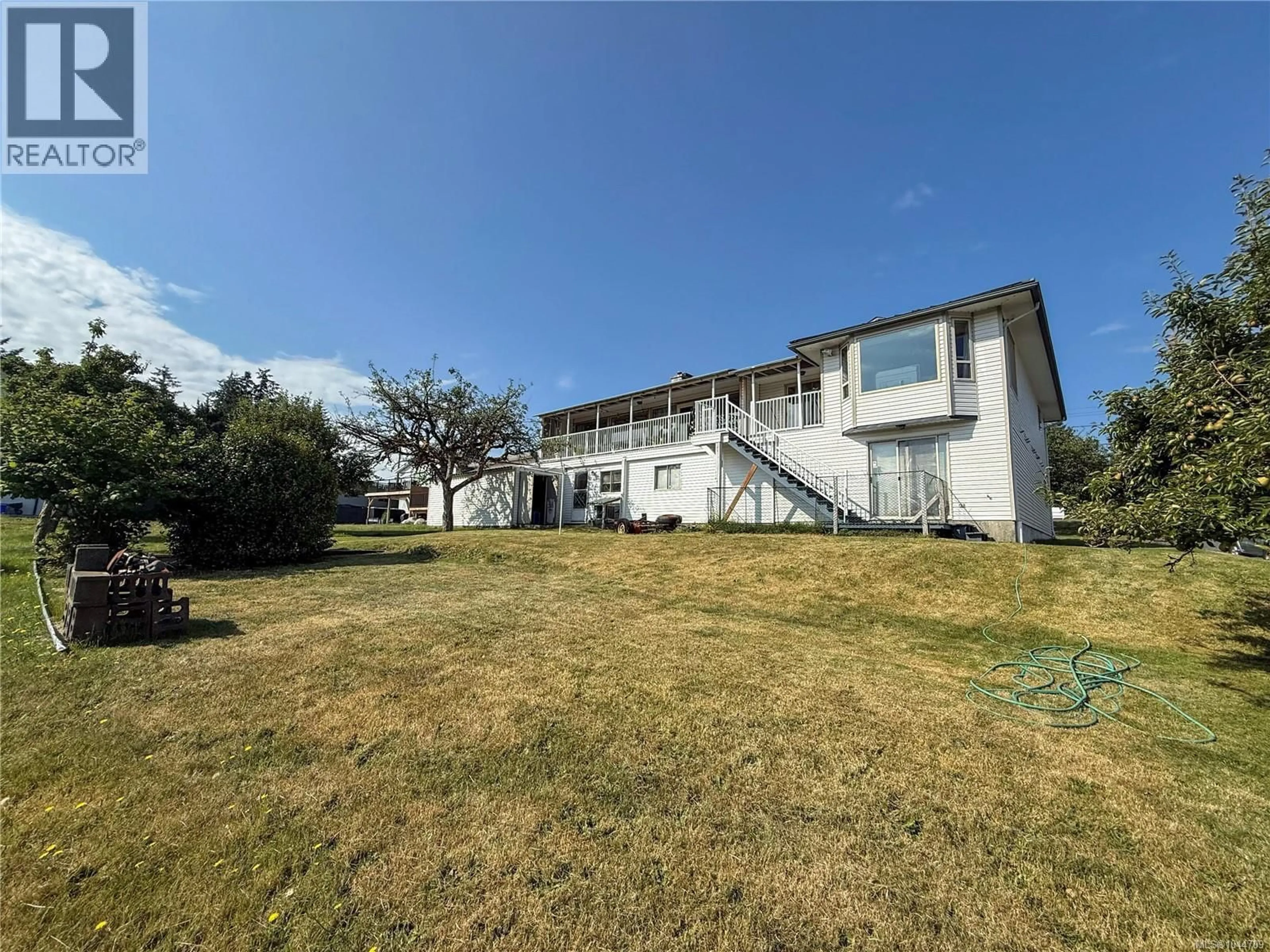 A pic from outside/outdoor area/front of a property/back of a property/a pic from drone, building for 4453 BARCLAY ROAD, Campbell River British Columbia V9W4Z1