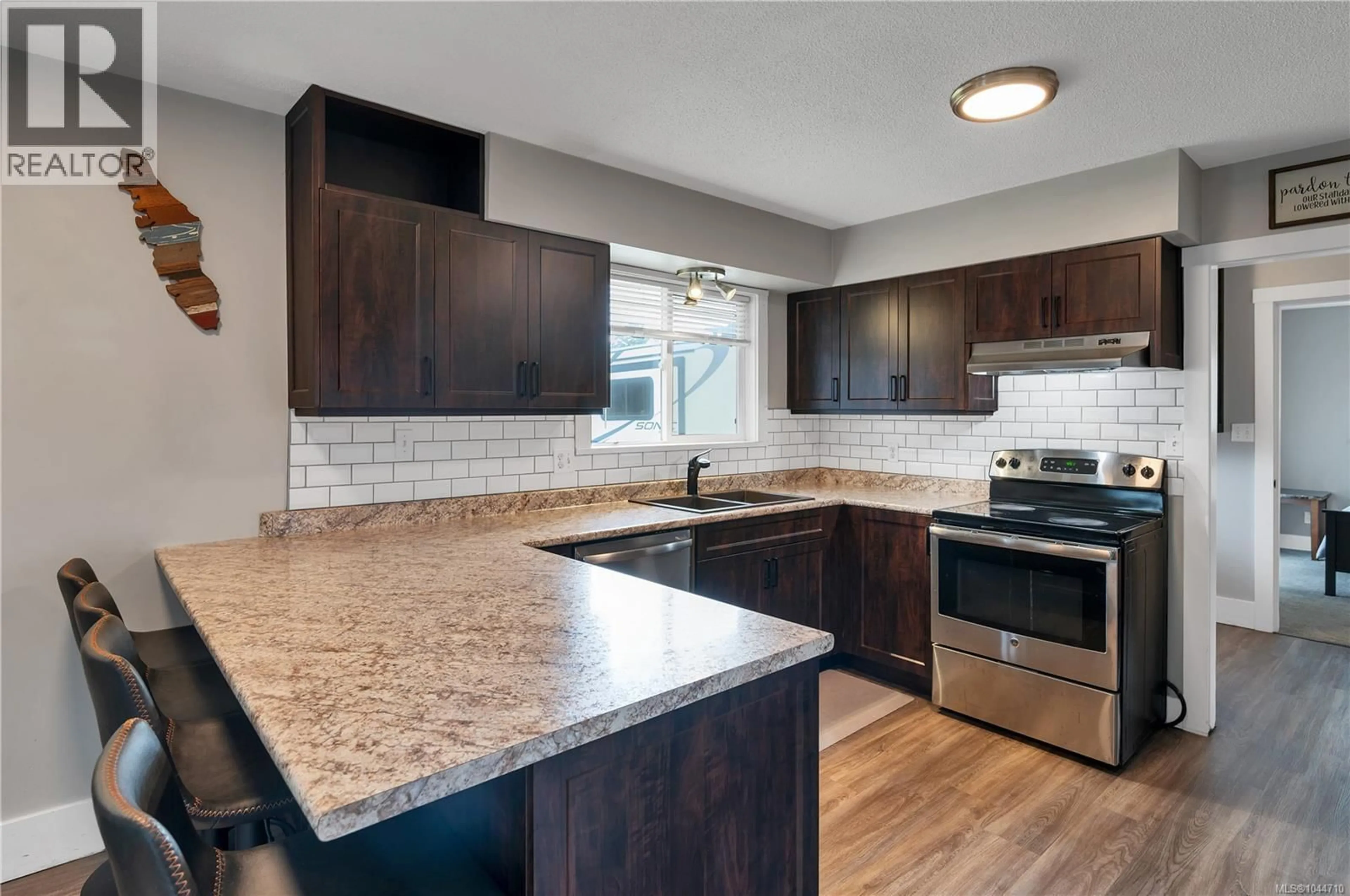 Open concept kitchen, ceramic/tile floor for 230 CAROLYN ROAD, Campbell River British Columbia V9W5M6