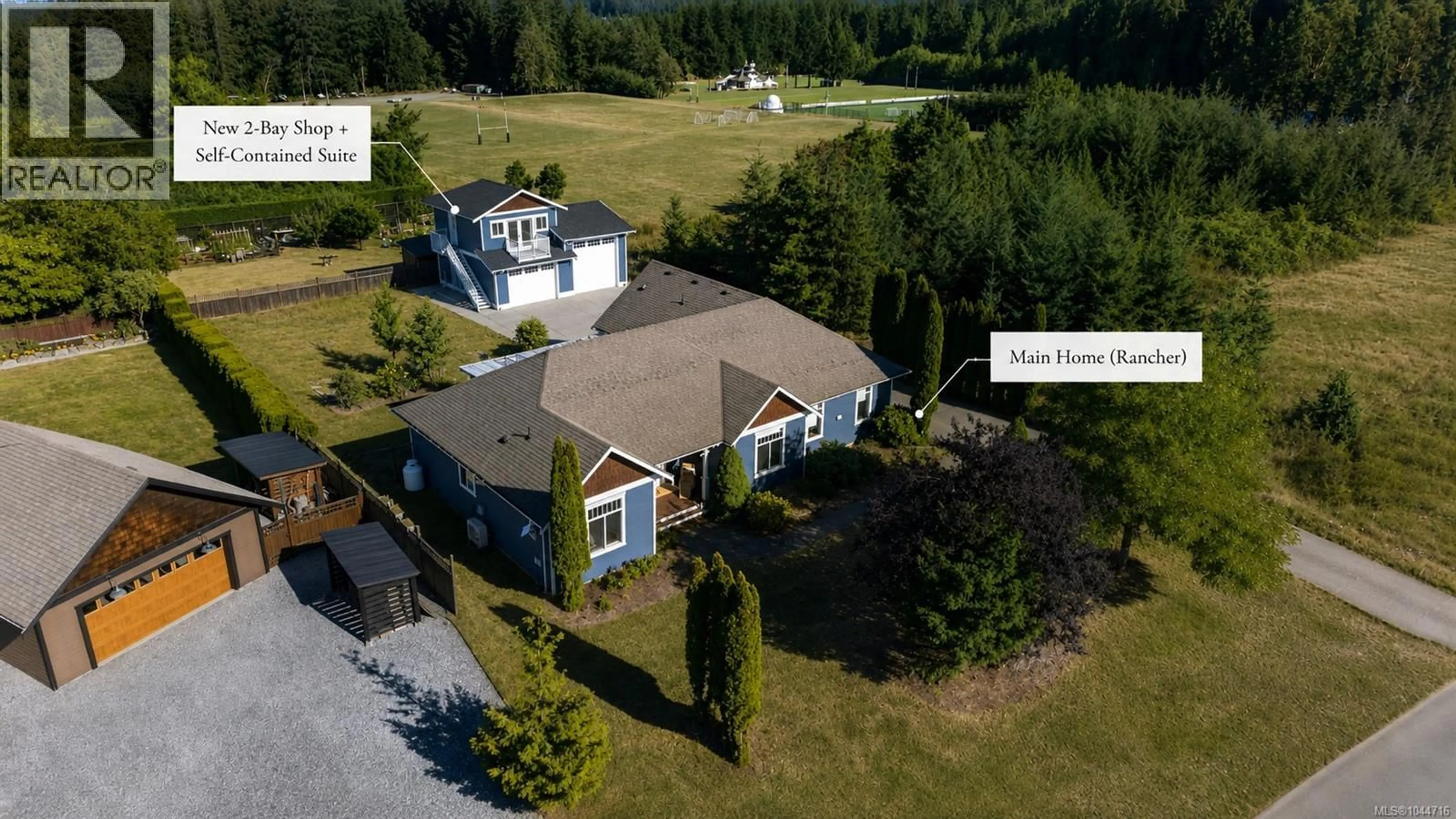 A pic from outside/outdoor area/front of a property/back of a property/a pic from drone, building for 2170 WILDFLOWER ROAD, Shawnigan Lake British Columbia V8H2G1