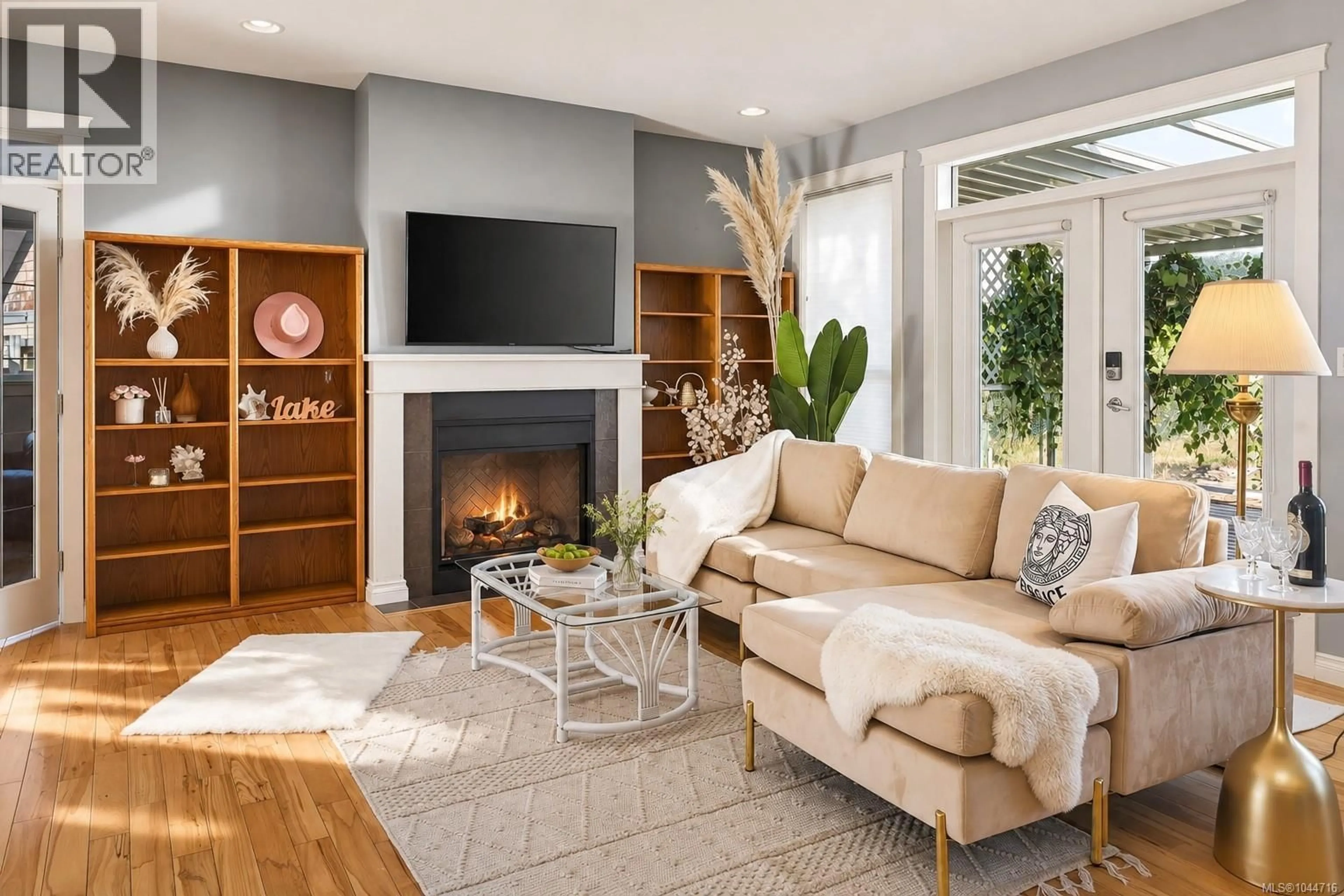 Living room with furniture, wood/laminate floor for 2170 WILDFLOWER ROAD, Shawnigan Lake British Columbia V8H2G1