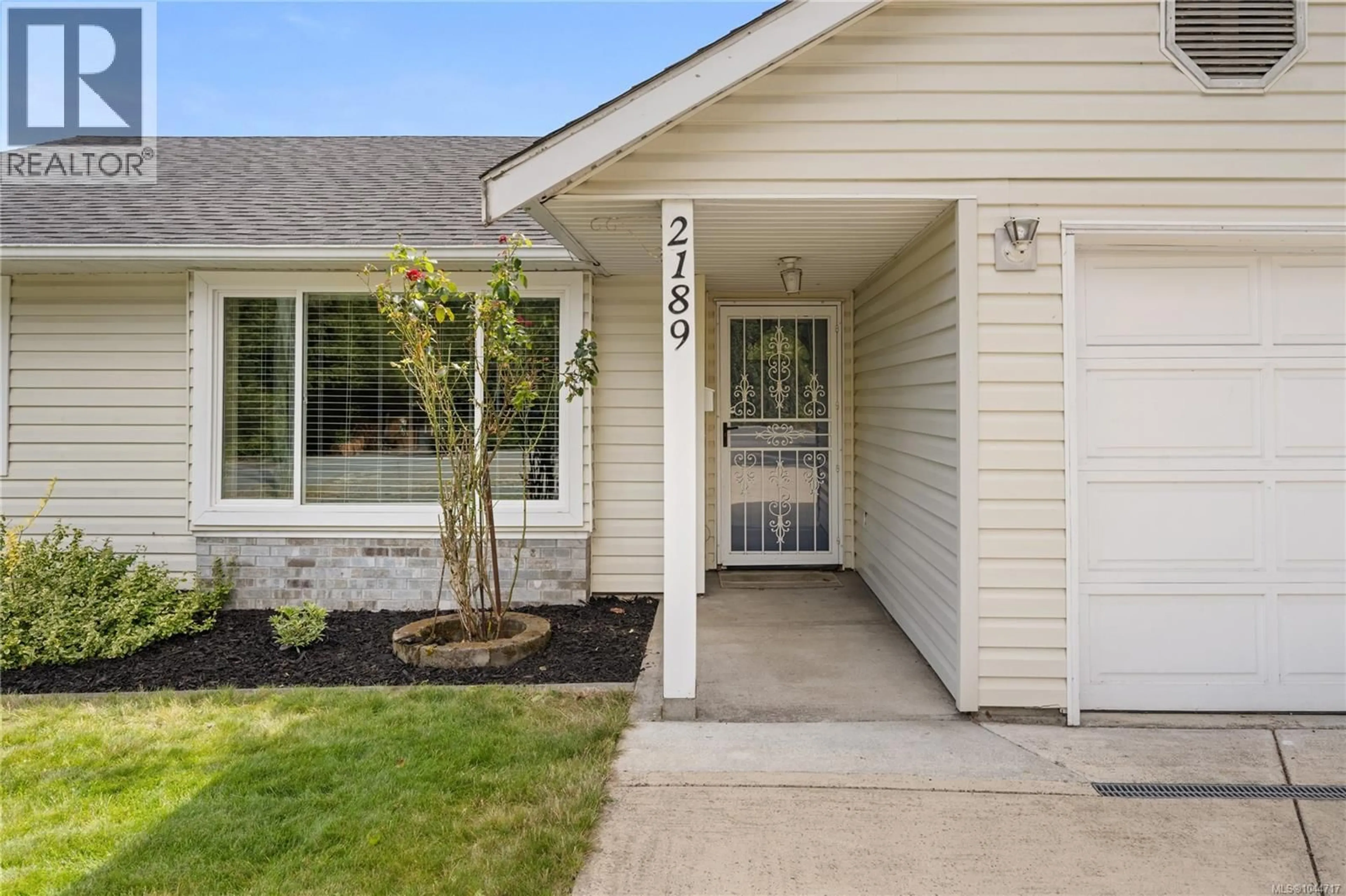 Home with vinyl exterior material, street for 2189 JINGLE POT ROAD, Nanaimo British Columbia V9R6J2