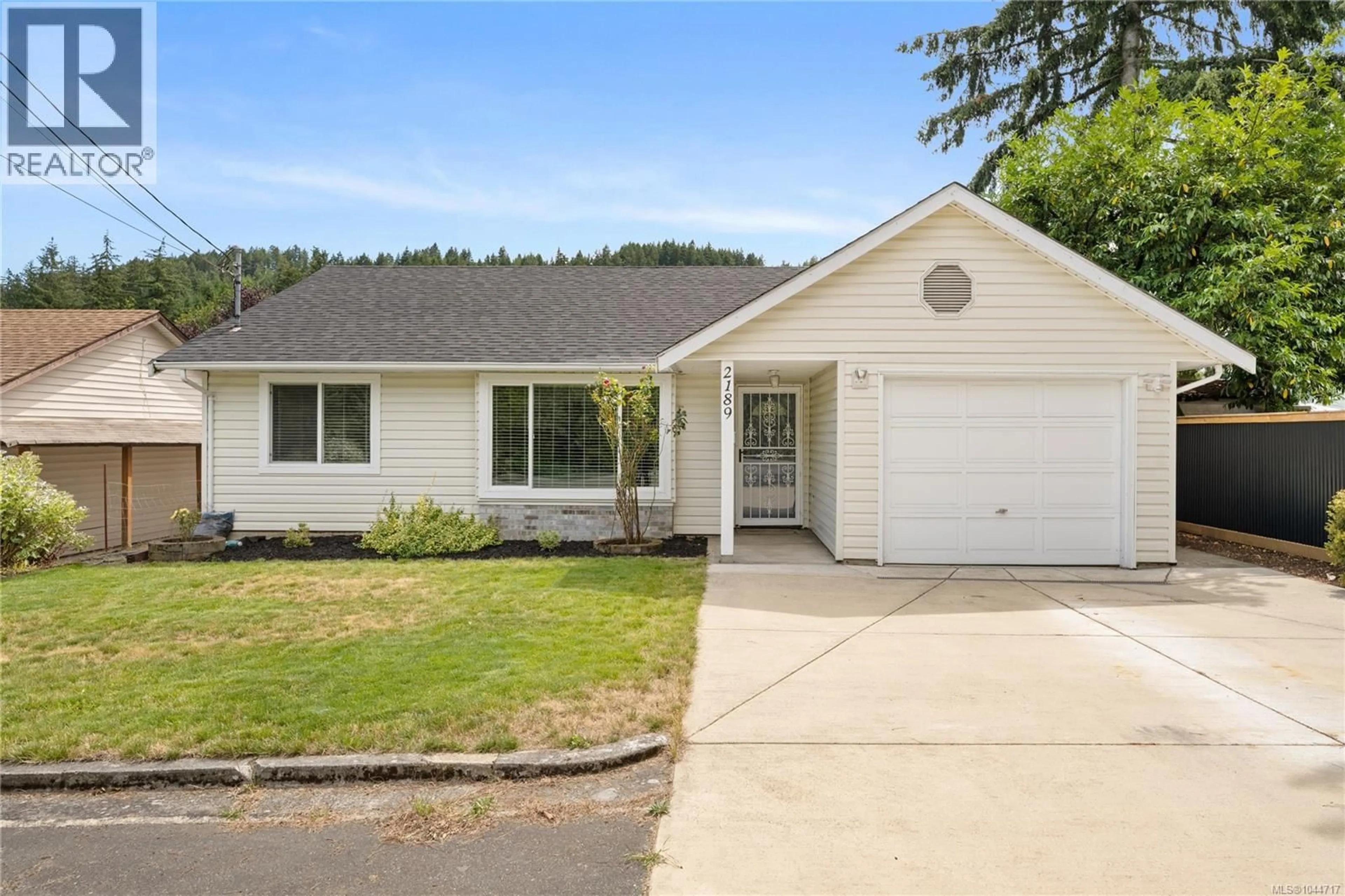 Home with vinyl exterior material, street for 2189 JINGLE POT ROAD, Nanaimo British Columbia V9R6J2