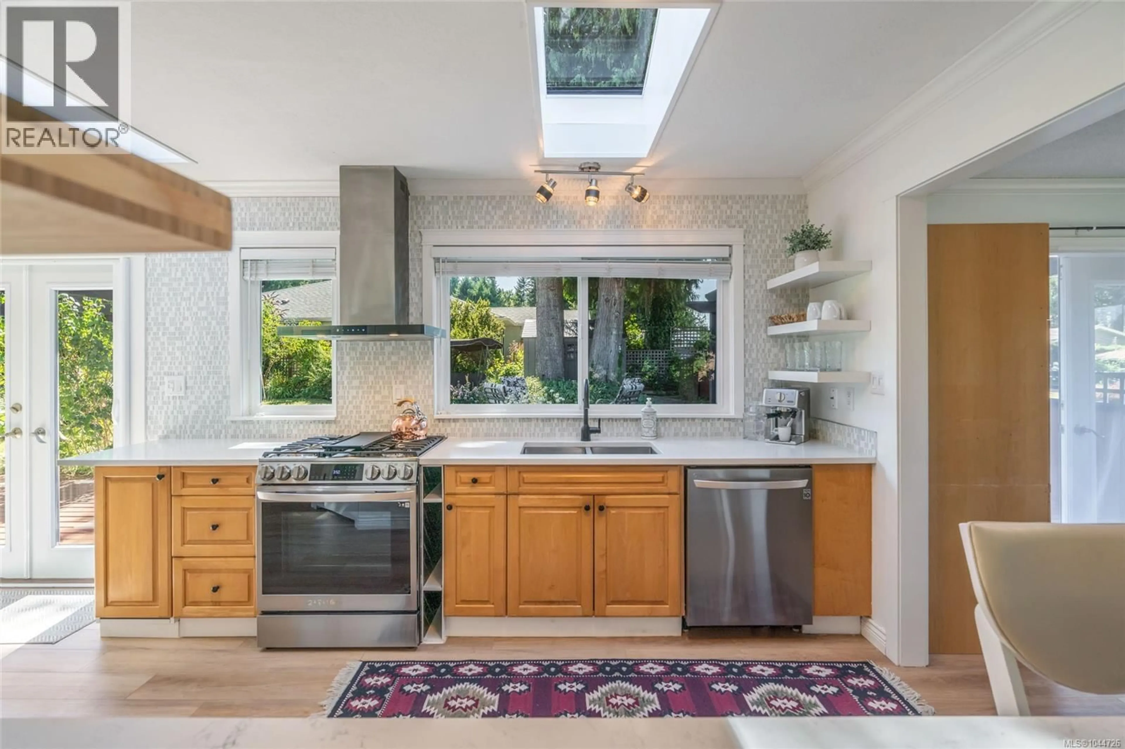 Open concept kitchen, ceramic/tile floor for 560 EAGLECREST DRIVE, Qualicum Beach British Columbia V9K1E3