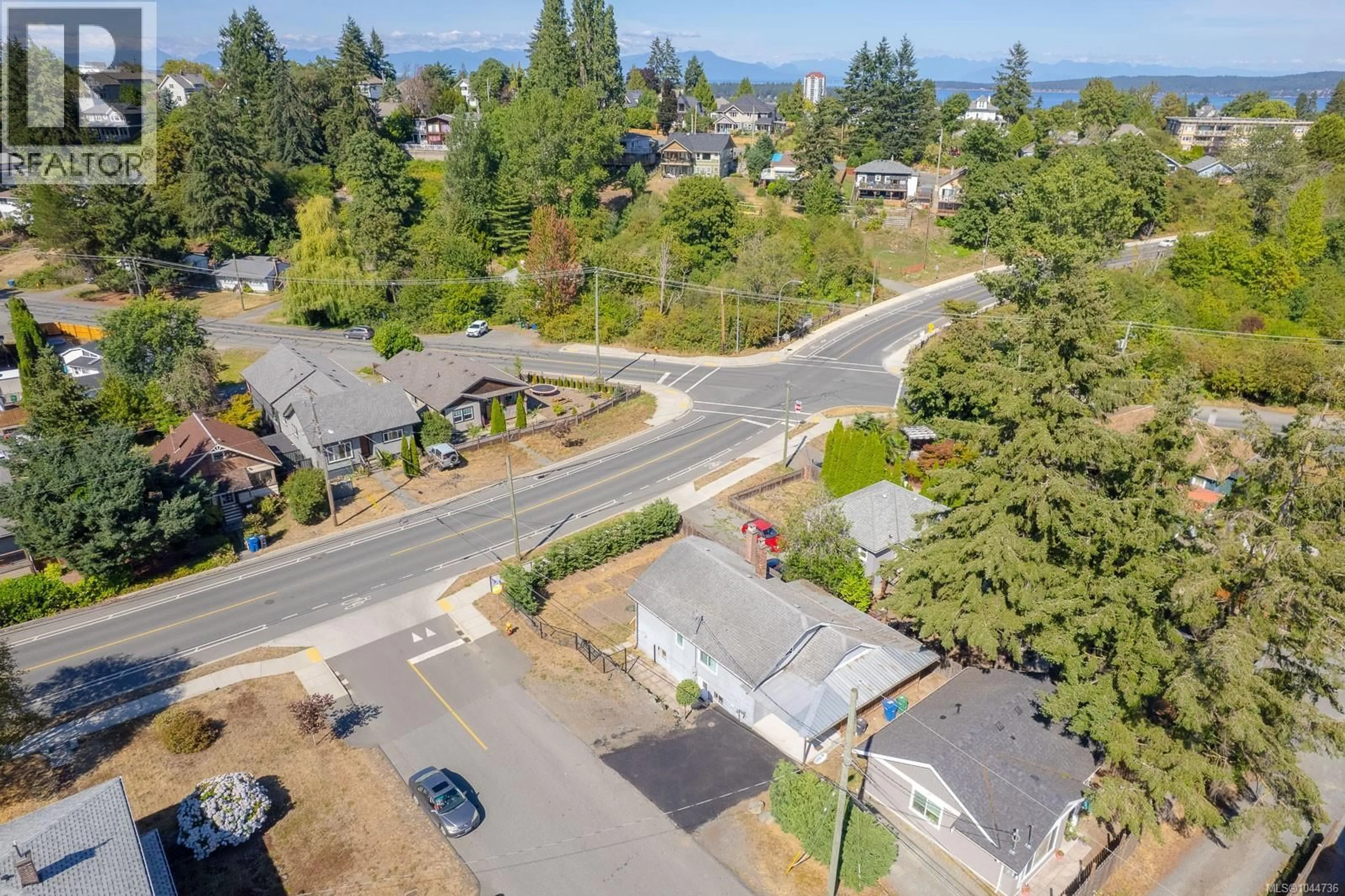 A pic from outside/outdoor area/front of a property/back of a property/a pic from drone, street for 15 FOURTH STREET, Nanaimo British Columbia V9R1S6