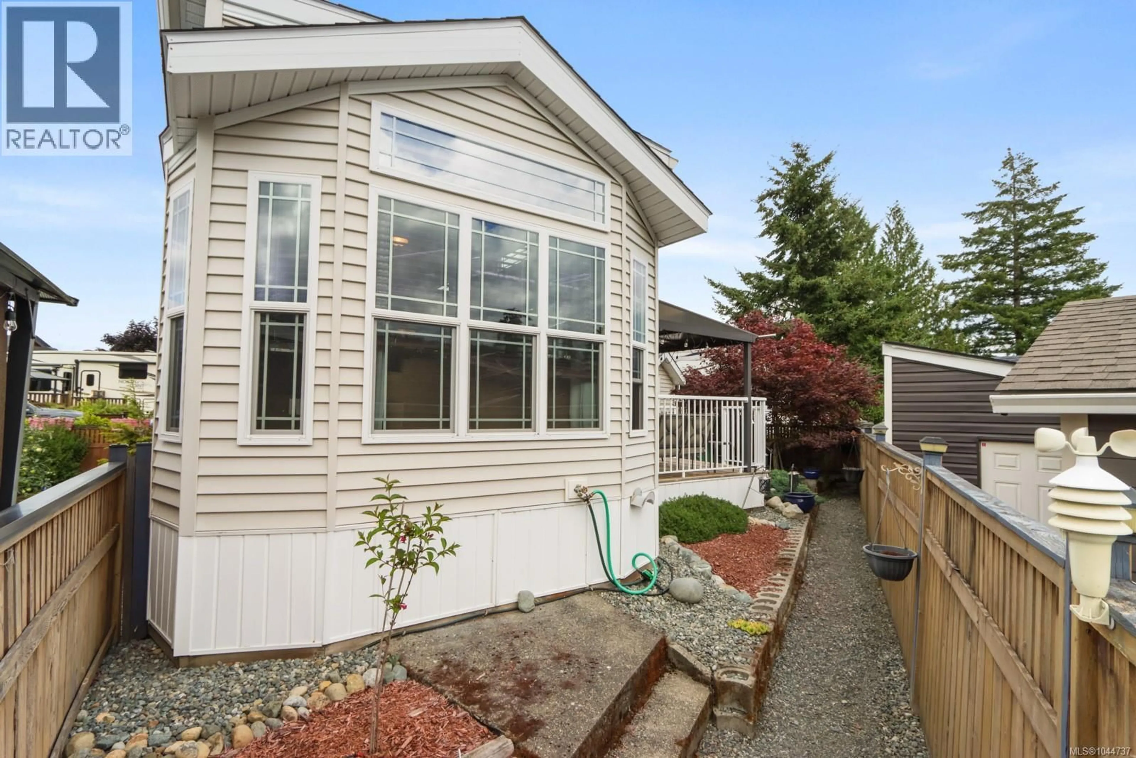 Home with vinyl exterior material, street for 2116 NIMPKISH LAKE WAY, Nanaimo British Columbia V9R0M3