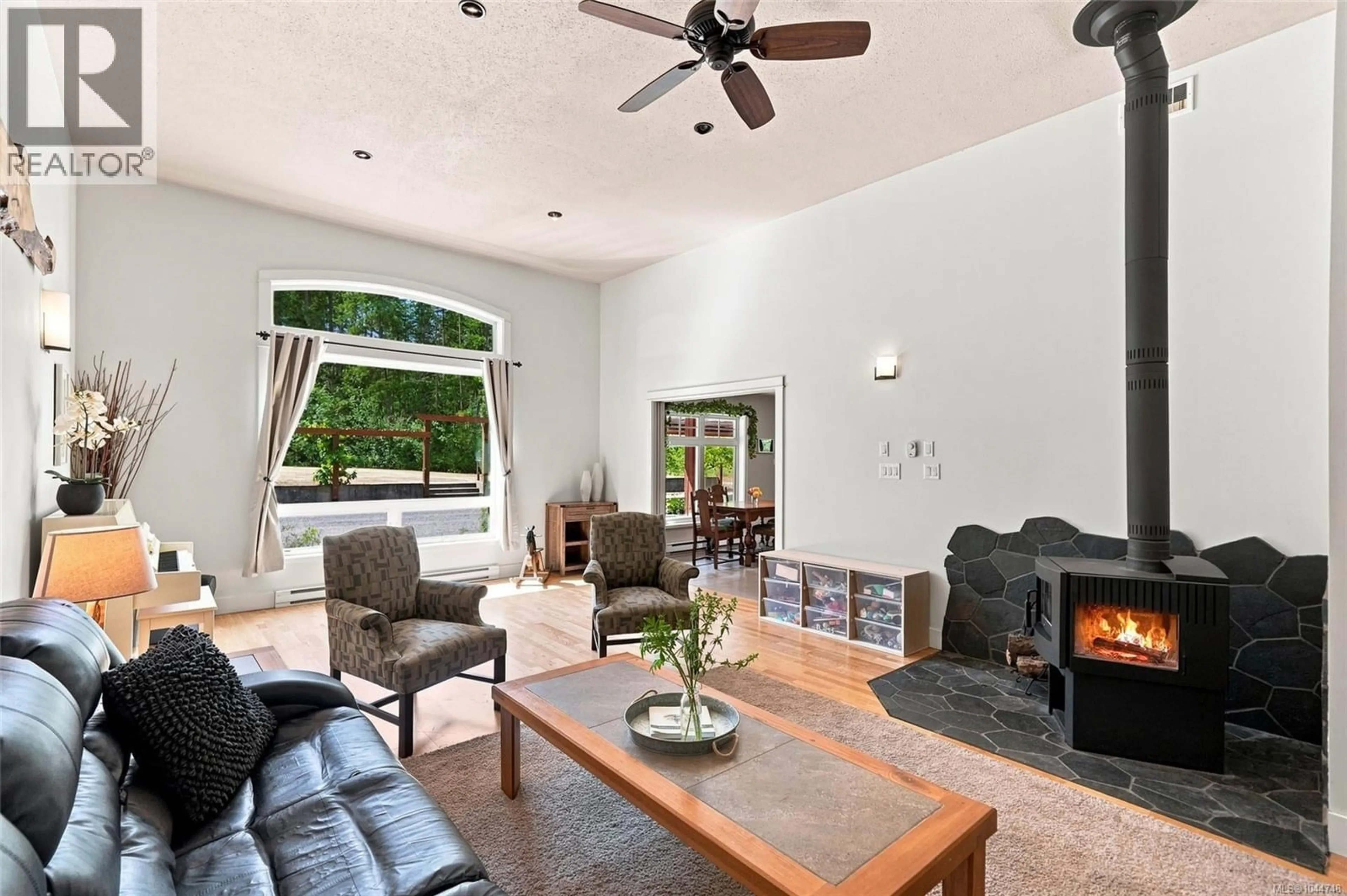 Living room with furniture, ceramic/tile floor for 1704 MATTERSON ROAD, Errington British Columbia V0R1V0