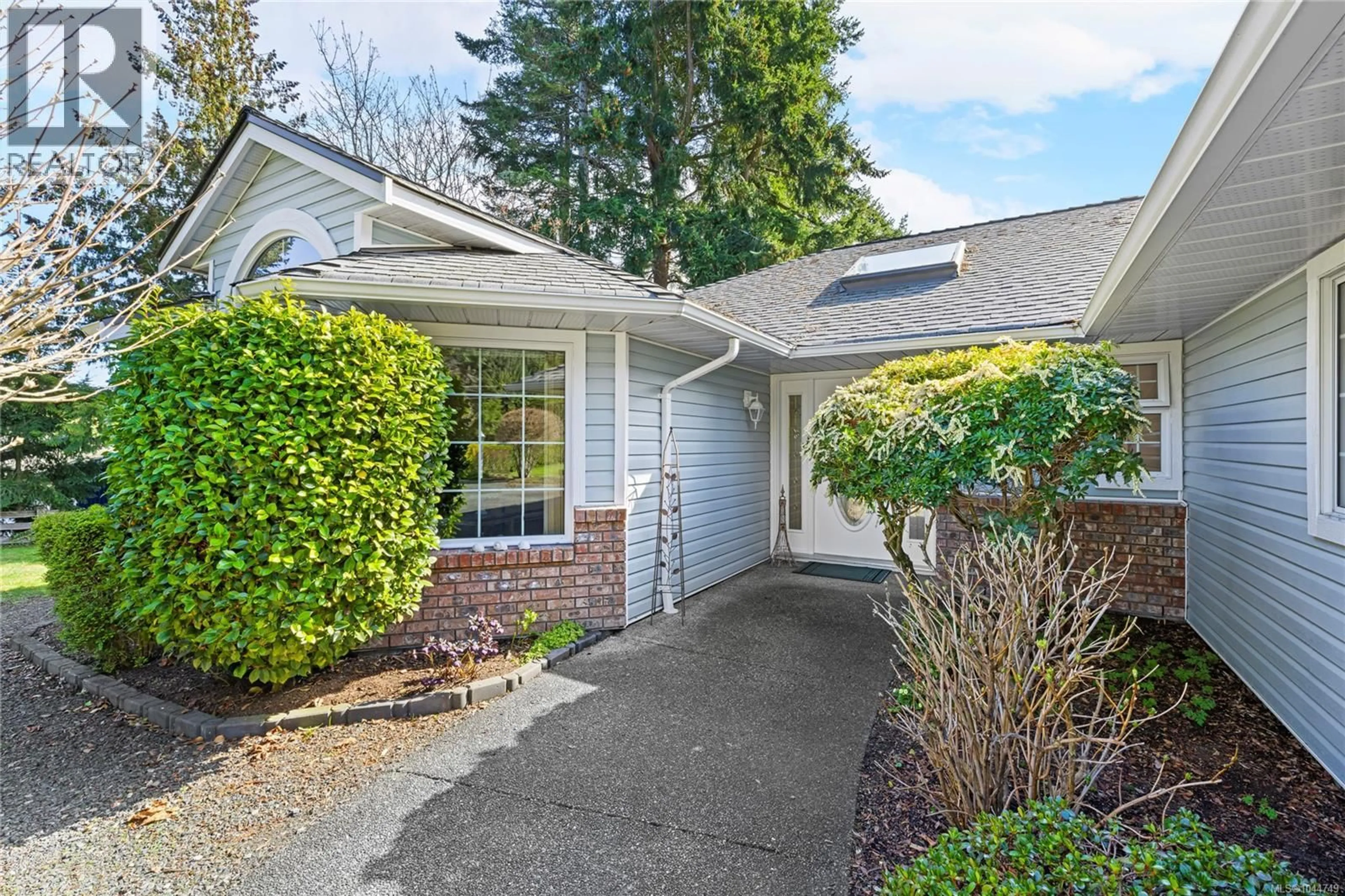 Home with vinyl exterior material, street for 1848 AMELIA CRESCENT, Nanoose Bay British Columbia V9P9C7