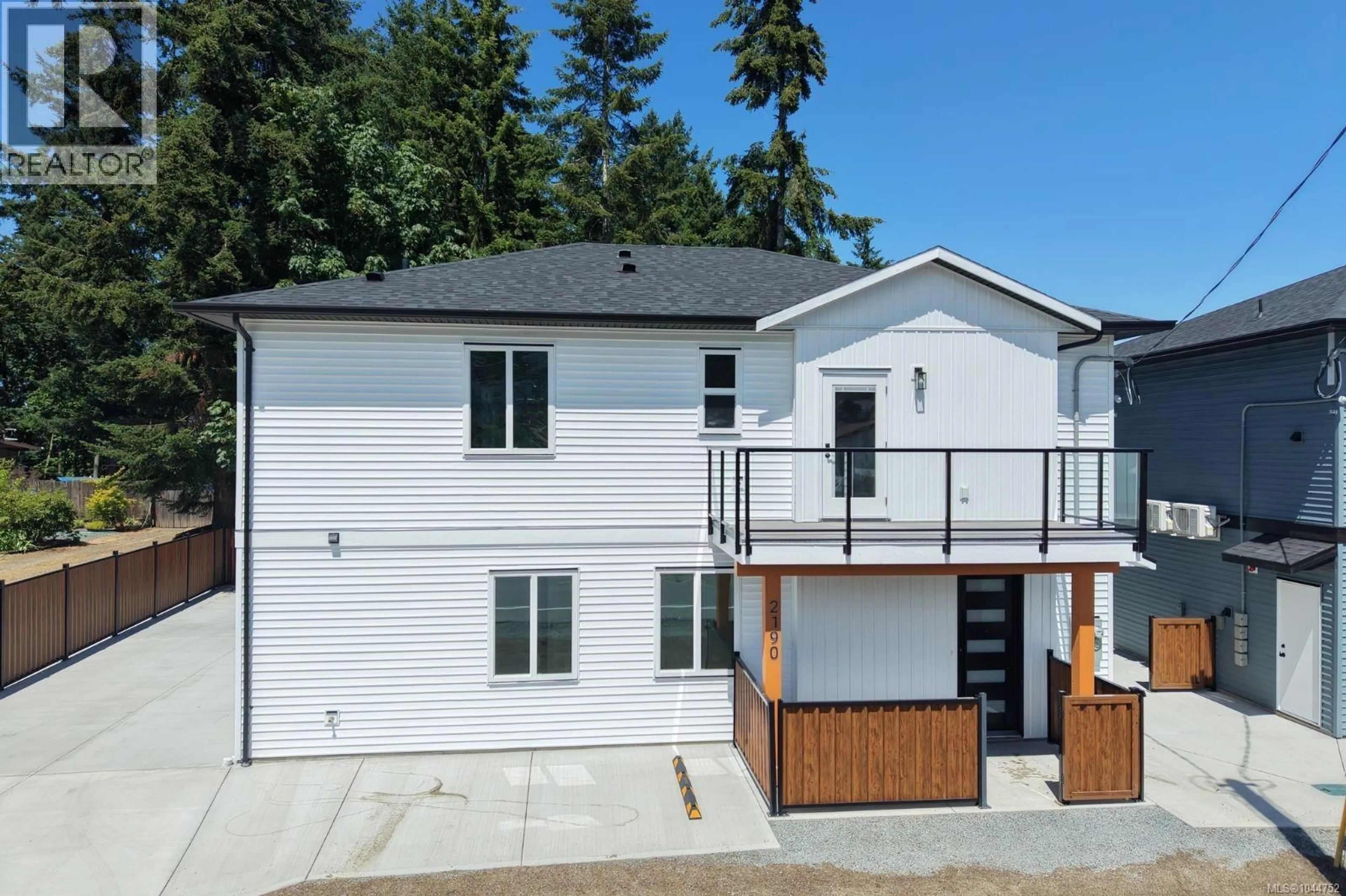 A pic from outside/outdoor area/front of a property/back of a property/a pic from drone, street for 200 - 2190 JINGLE POT ROAD, Nanaimo British Columbia V9R6J2