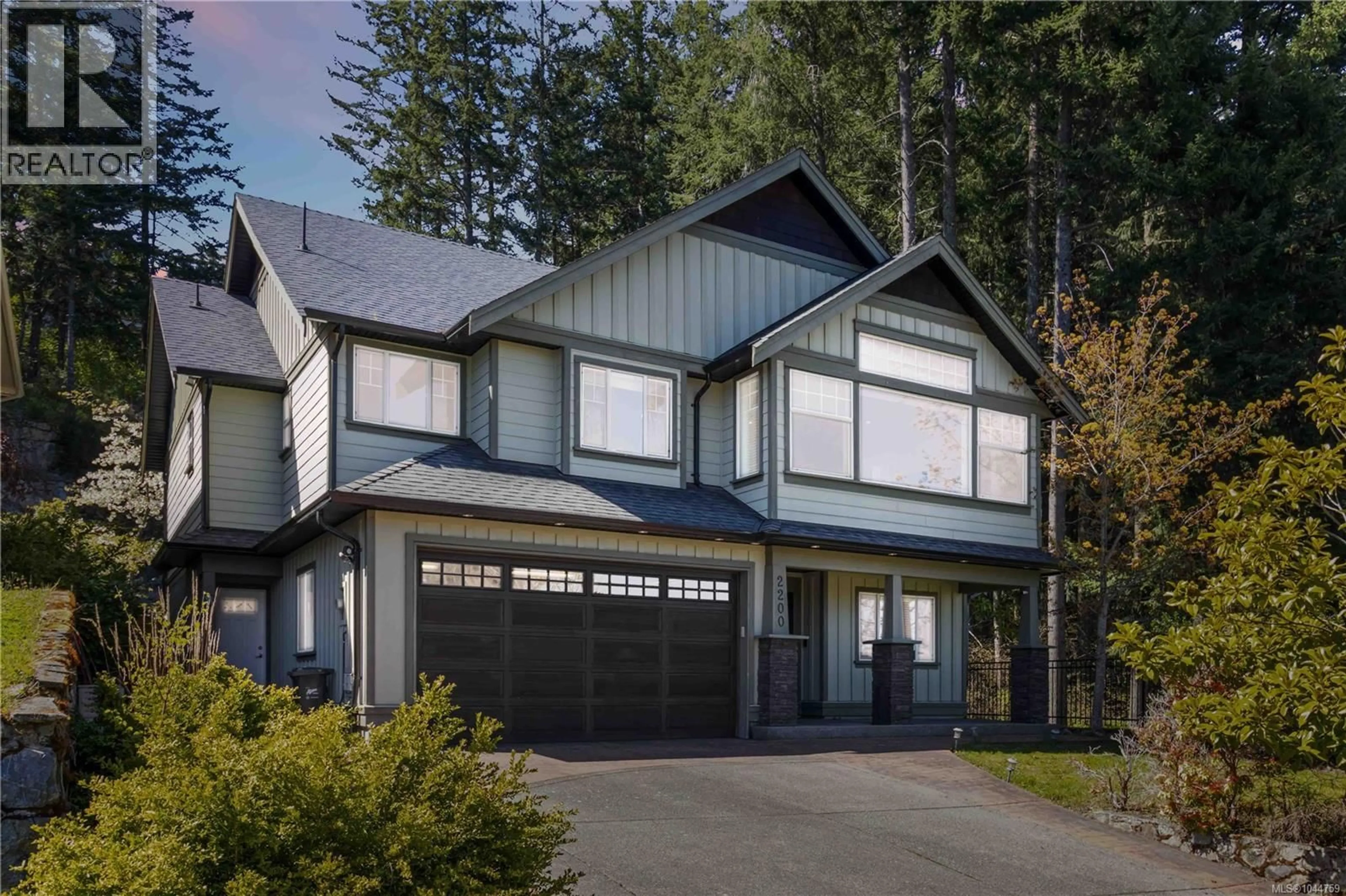 Home with vinyl exterior material, street for 2200 PLAYERS DRIVE, Langford British Columbia V9B0L2