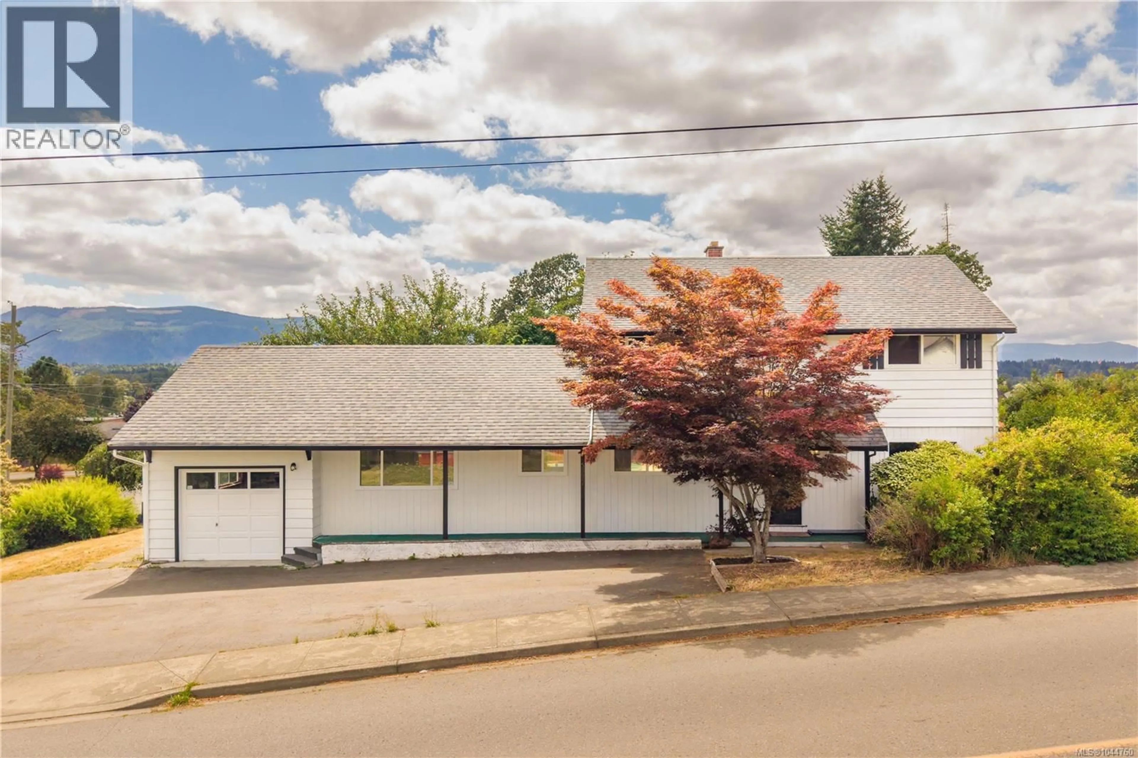 A pic from outside/outdoor area/front of a property/back of a property/a pic from drone, street for 5892 JAYNES ROAD, Duncan British Columbia V9L3C1