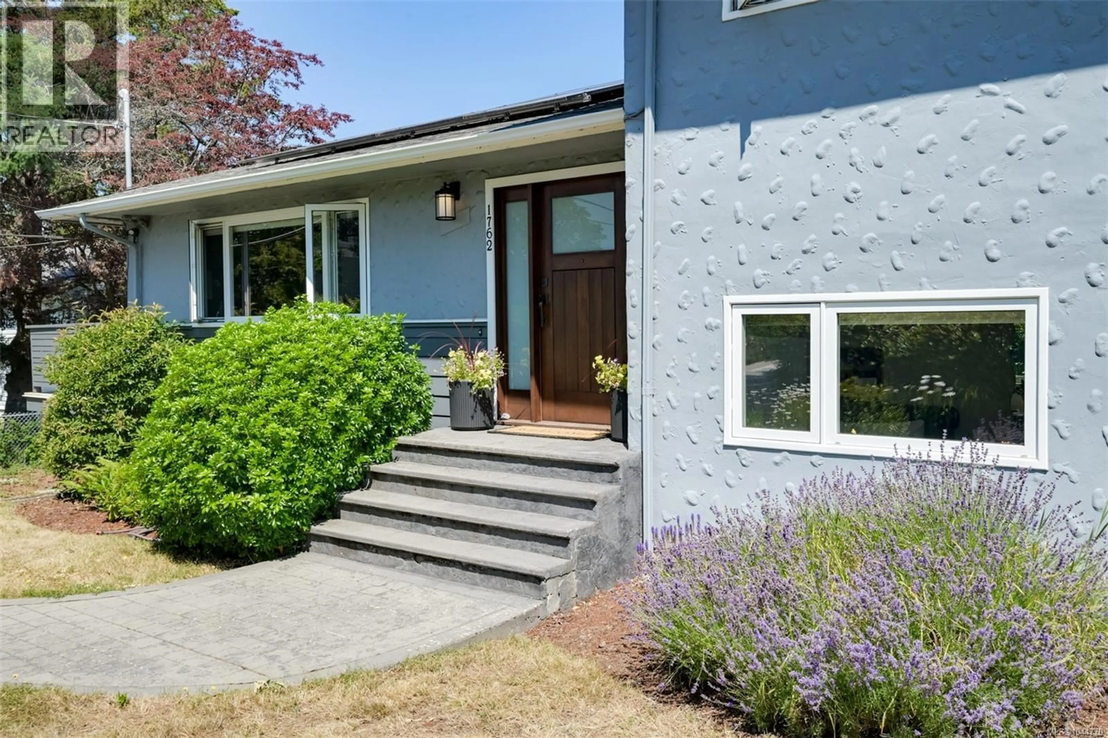 Home with vinyl exterior material, street for 1762 MIDGARD AVENUE, Saanich British Columbia V8P2Y7
