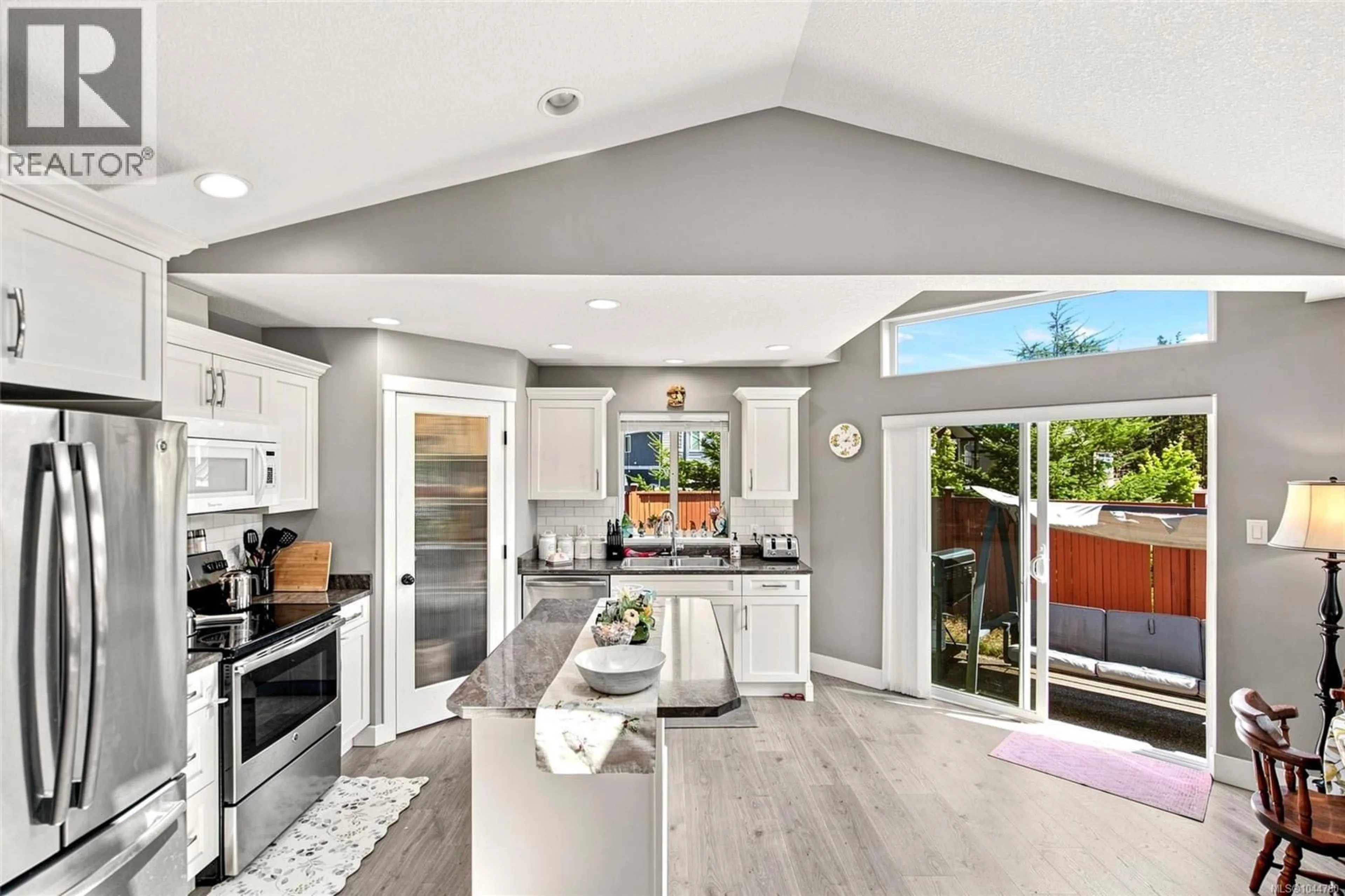 Open concept kitchen, ceramic/tile floor for 100 CARLO PLACE, Nanaimo British Columbia V9X0B3