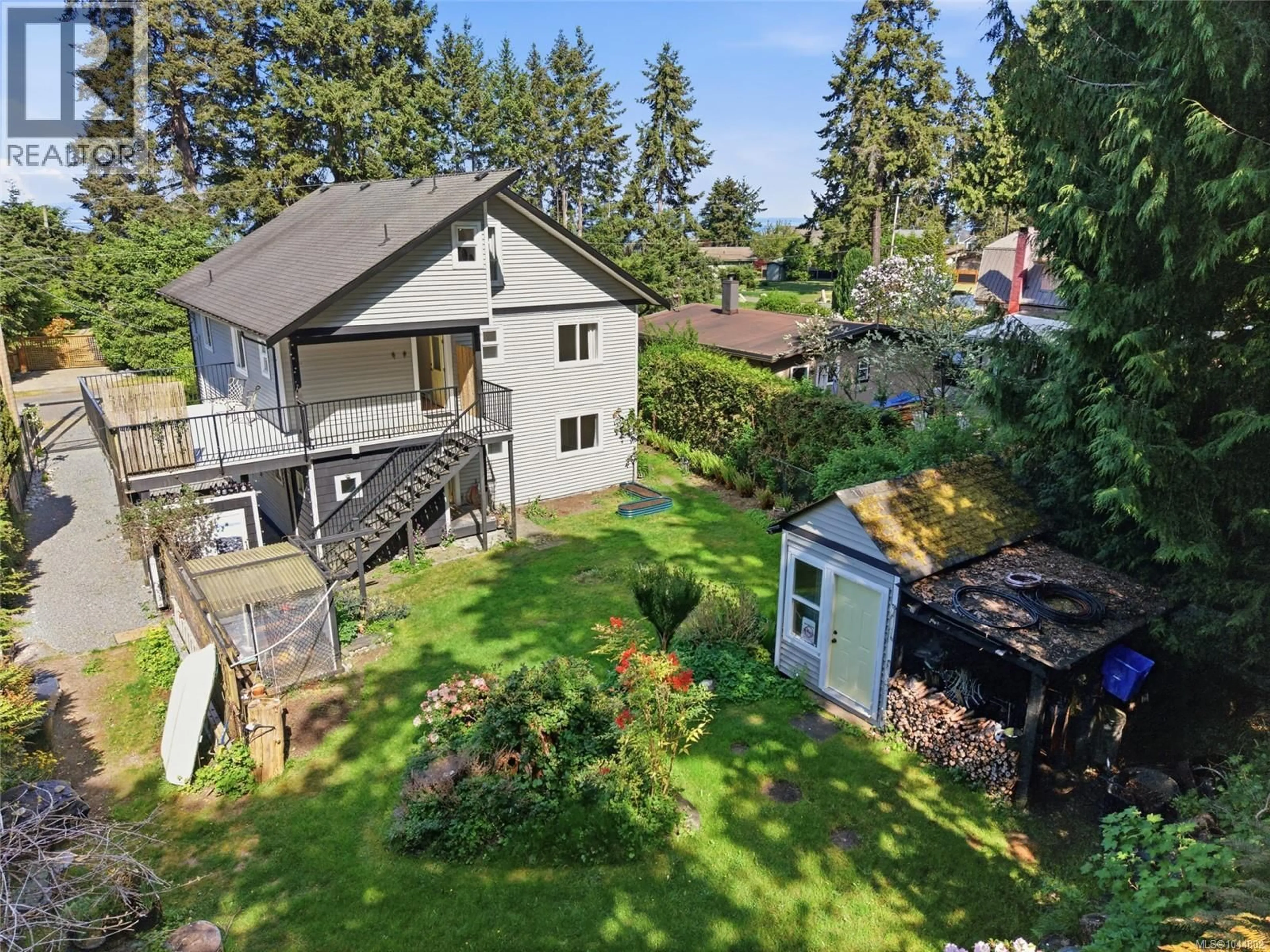 A pic from outside/outdoor area/front of a property/back of a property/a pic from drone, street for 3970 BOVANIS ROAD, Bowser British Columbia V0R1G0