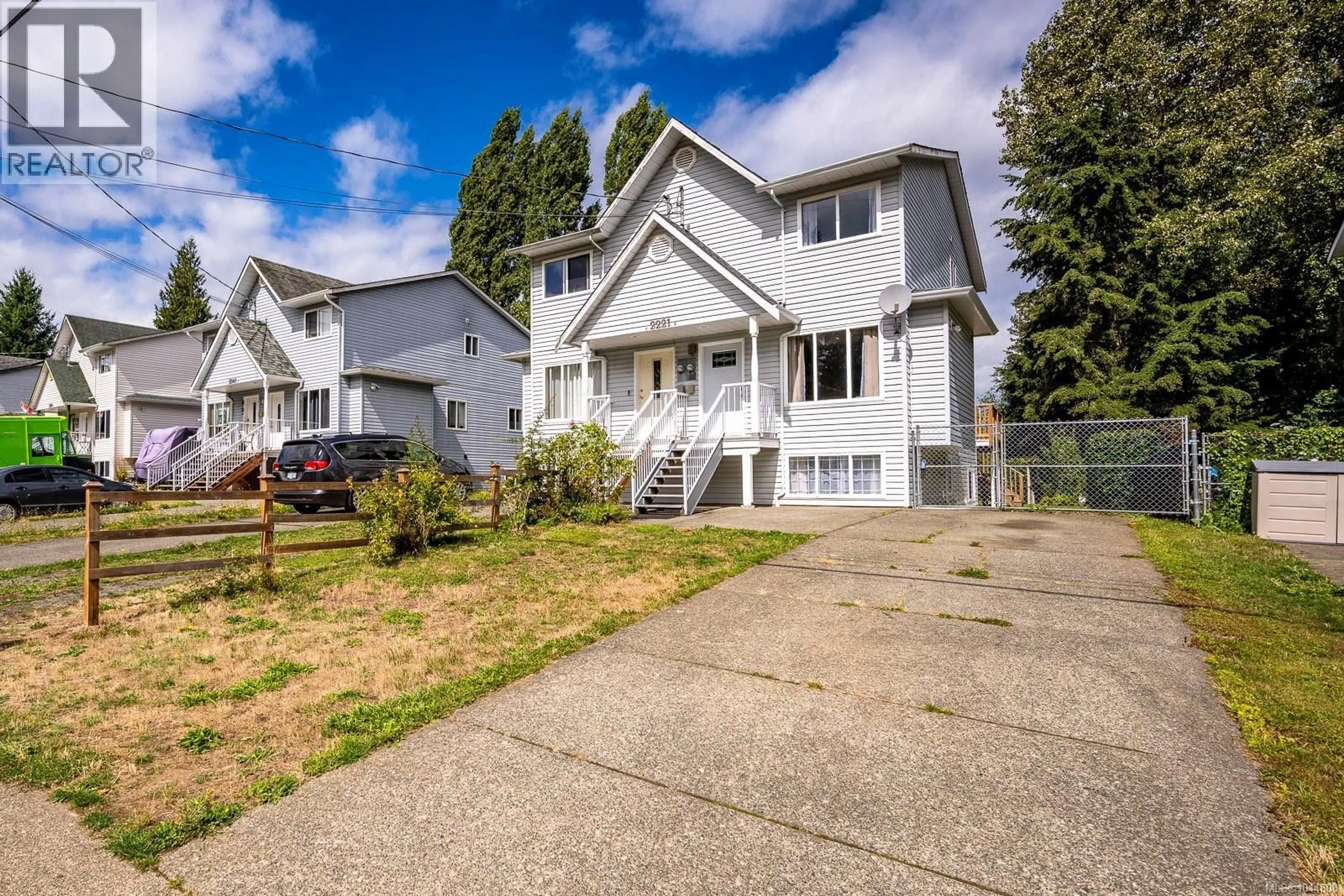 A pic from outside/outdoor area/front of a property/back of a property/a pic from drone, street for B - 2221 EMBLETON CRESCENT, Courtenay British Columbia V9M8W9