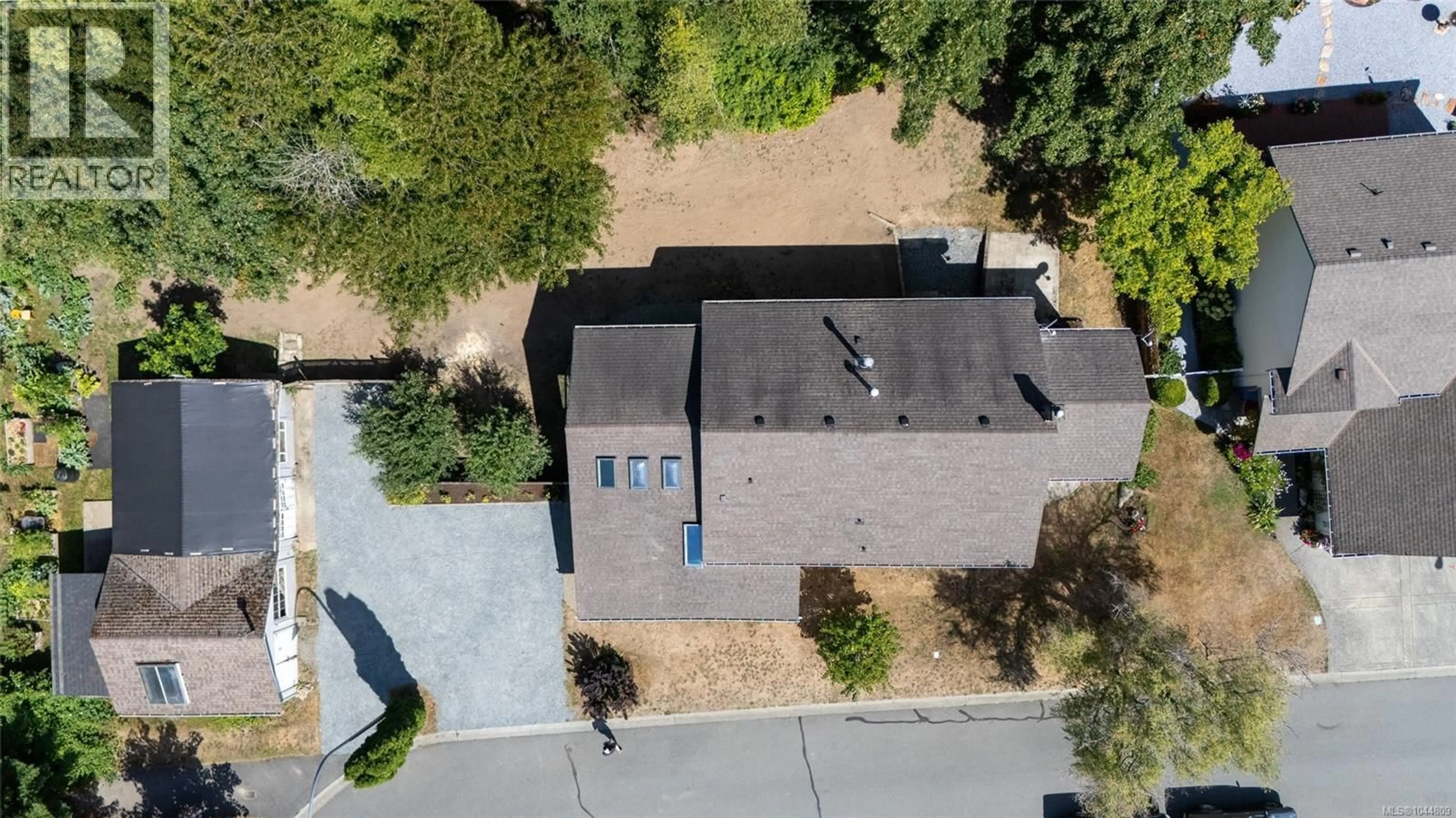 A pic from outside/outdoor area/front of a property/back of a property/a pic from drone, street for 3 - 6304 LANE ROAD, Duncan British Columbia V9L3T1