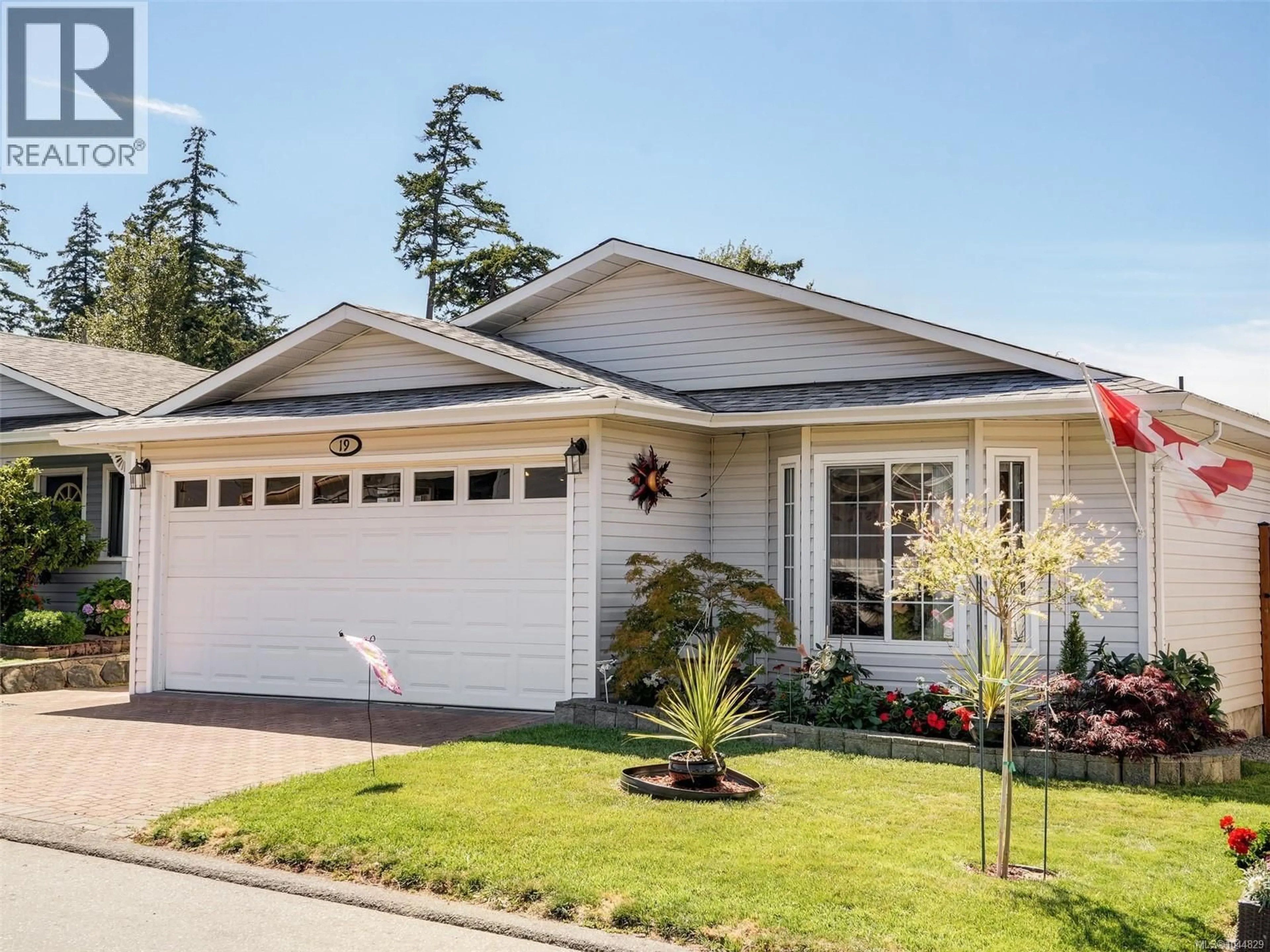 Home with vinyl exterior material, street for 19 EAGLE LANE, View Royal British Columbia V9A7M2
