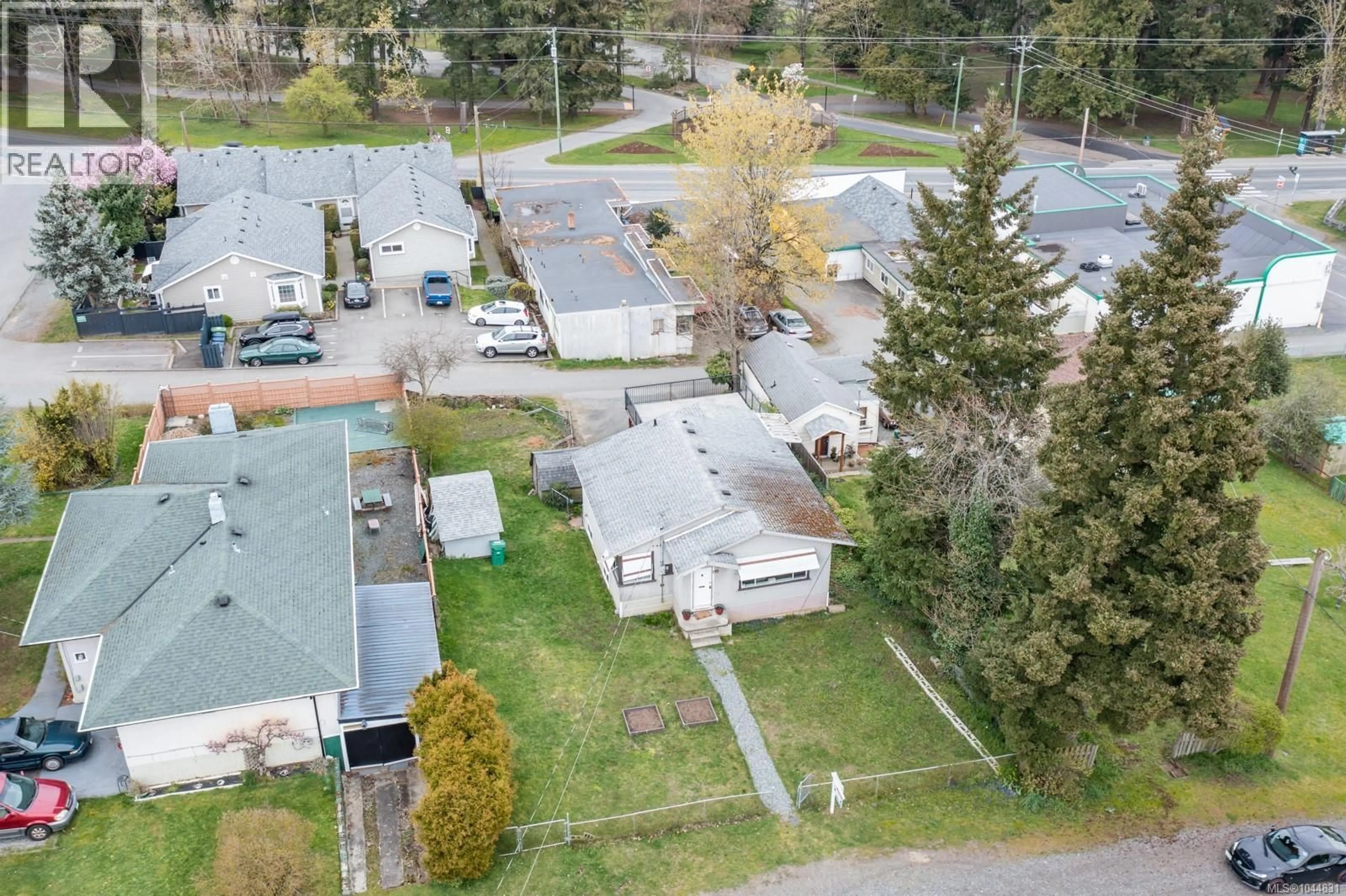 A pic from outside/outdoor area/front of a property/back of a property/a pic from drone, street for 611 FIRST STREET, Nanaimo British Columbia V9R1Y8