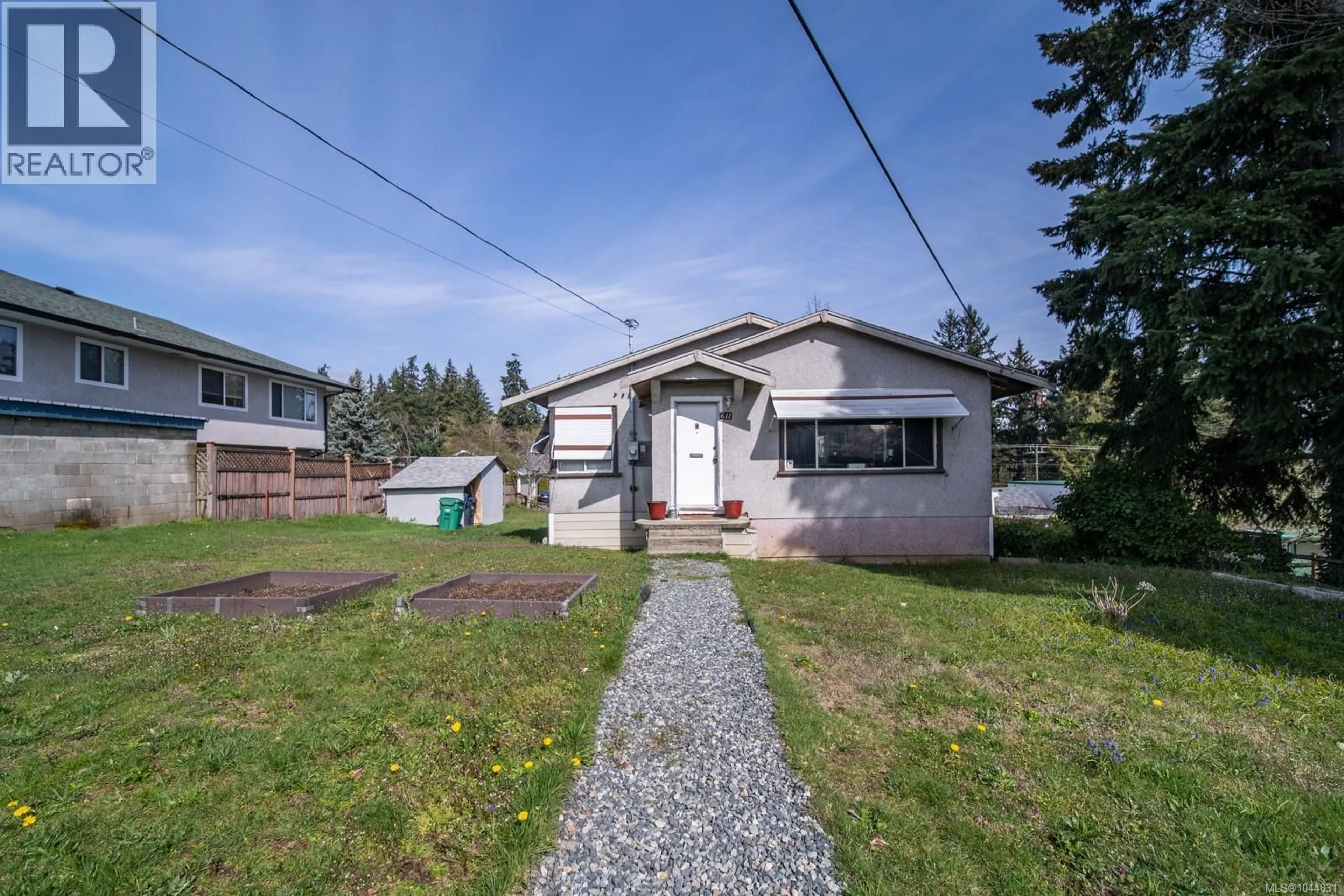 A pic from outside/outdoor area/front of a property/back of a property/a pic from drone, street for 611 FIRST STREET, Nanaimo British Columbia V9R1Y8