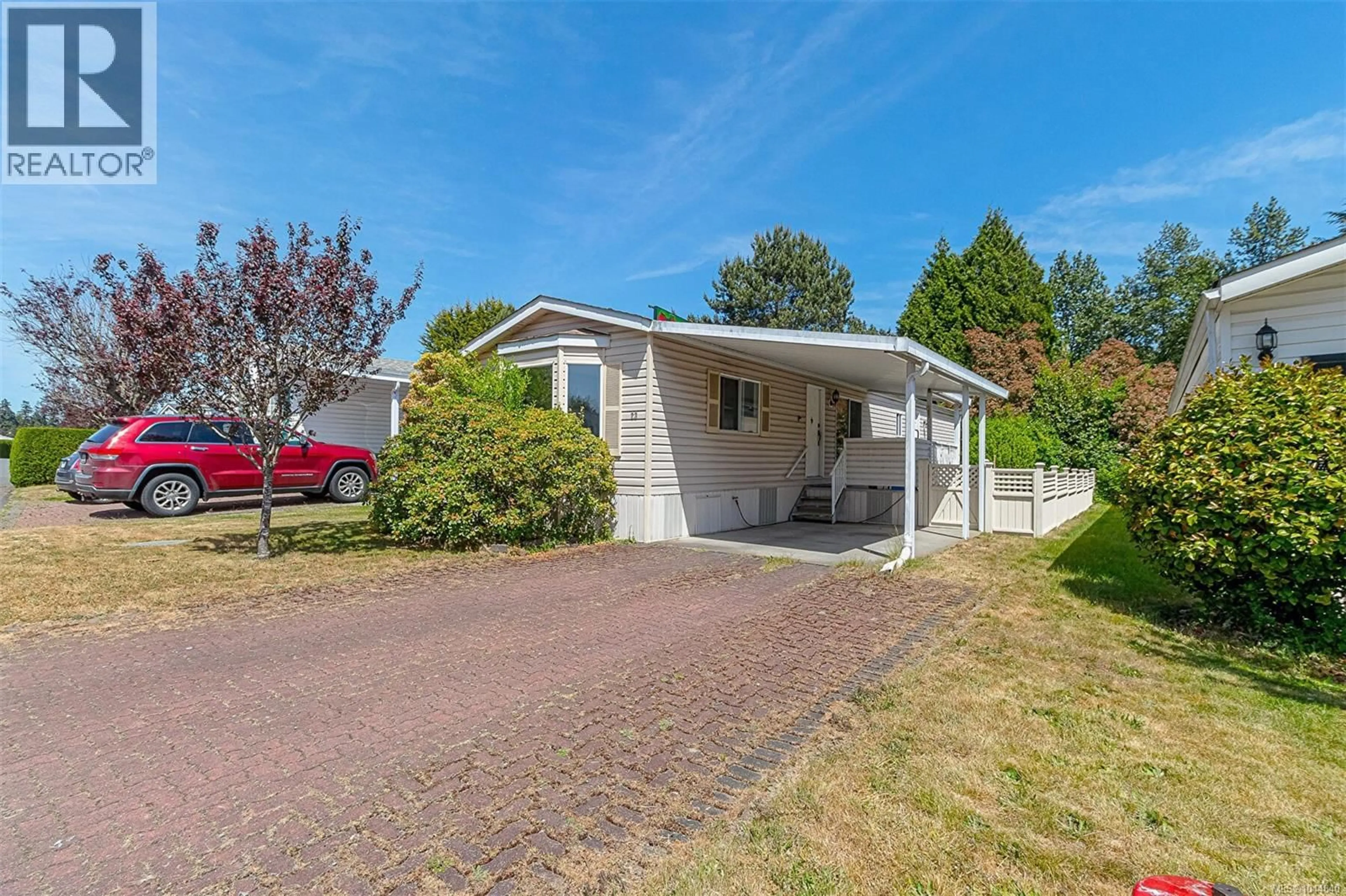 Home with vinyl exterior material, street for 23 - 7583 CENTRAL SAANICH ROAD, Central Saanich British Columbia V8M2B6