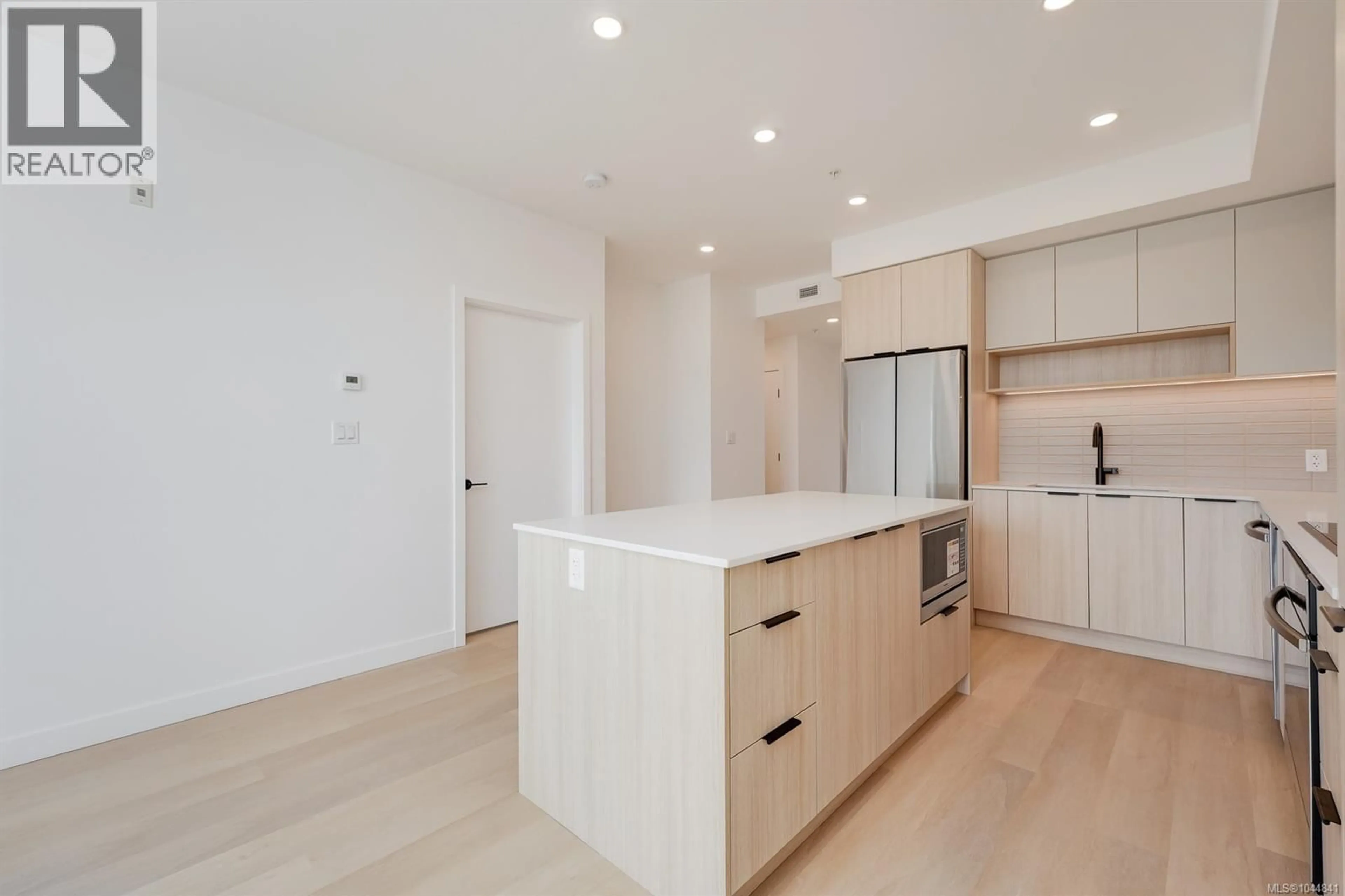 Open concept kitchen, unknown for 212 - 3564 A RYDER HESJEDAL WAY, Colwood British Columbia V9C3A1