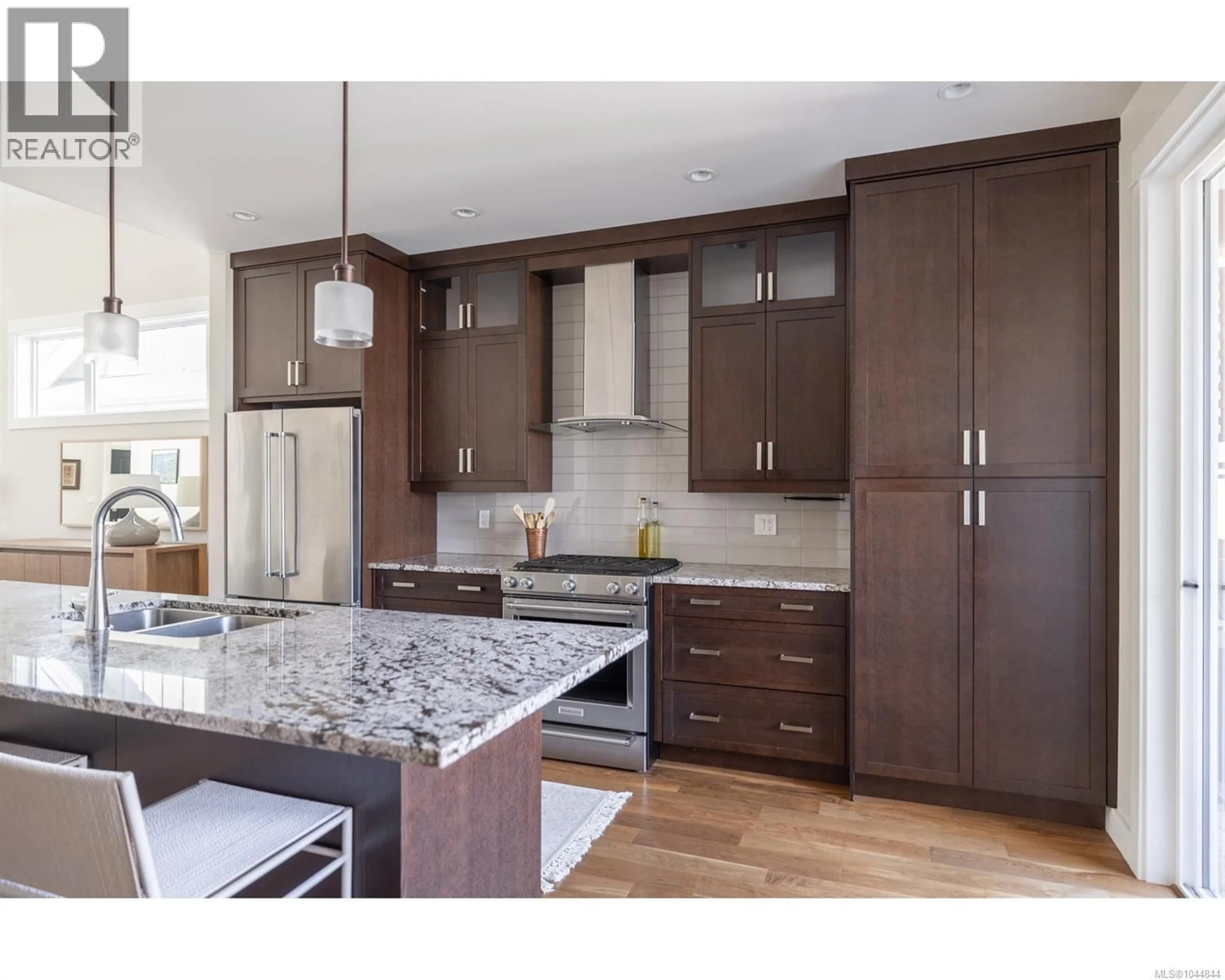 Contemporary kitchen, wood/laminate floor for 749 WEST RIDGE WAY, Qualicum Beach British Columbia V9K0A9