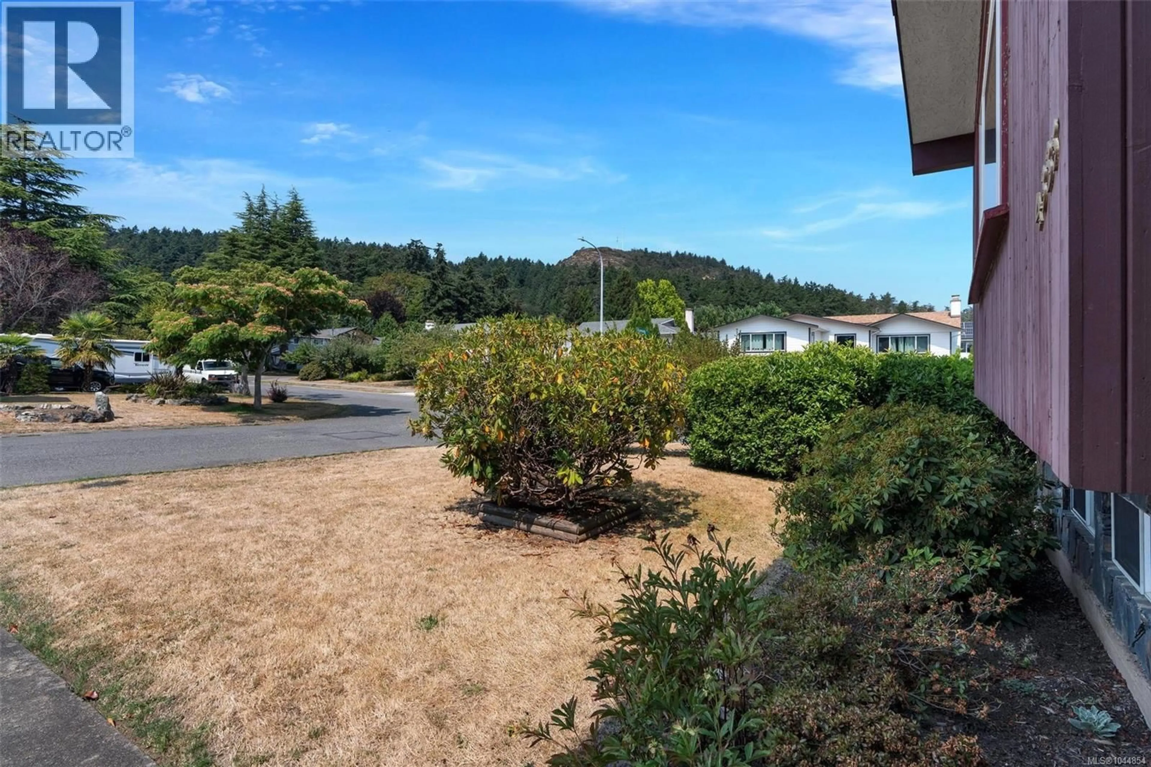 A pic from outside/outdoor area/front of a property/back of a property/a pic from drone, unknown for 4333 RAMSAY PLACE, Saanich British Columbia V8N4Y8