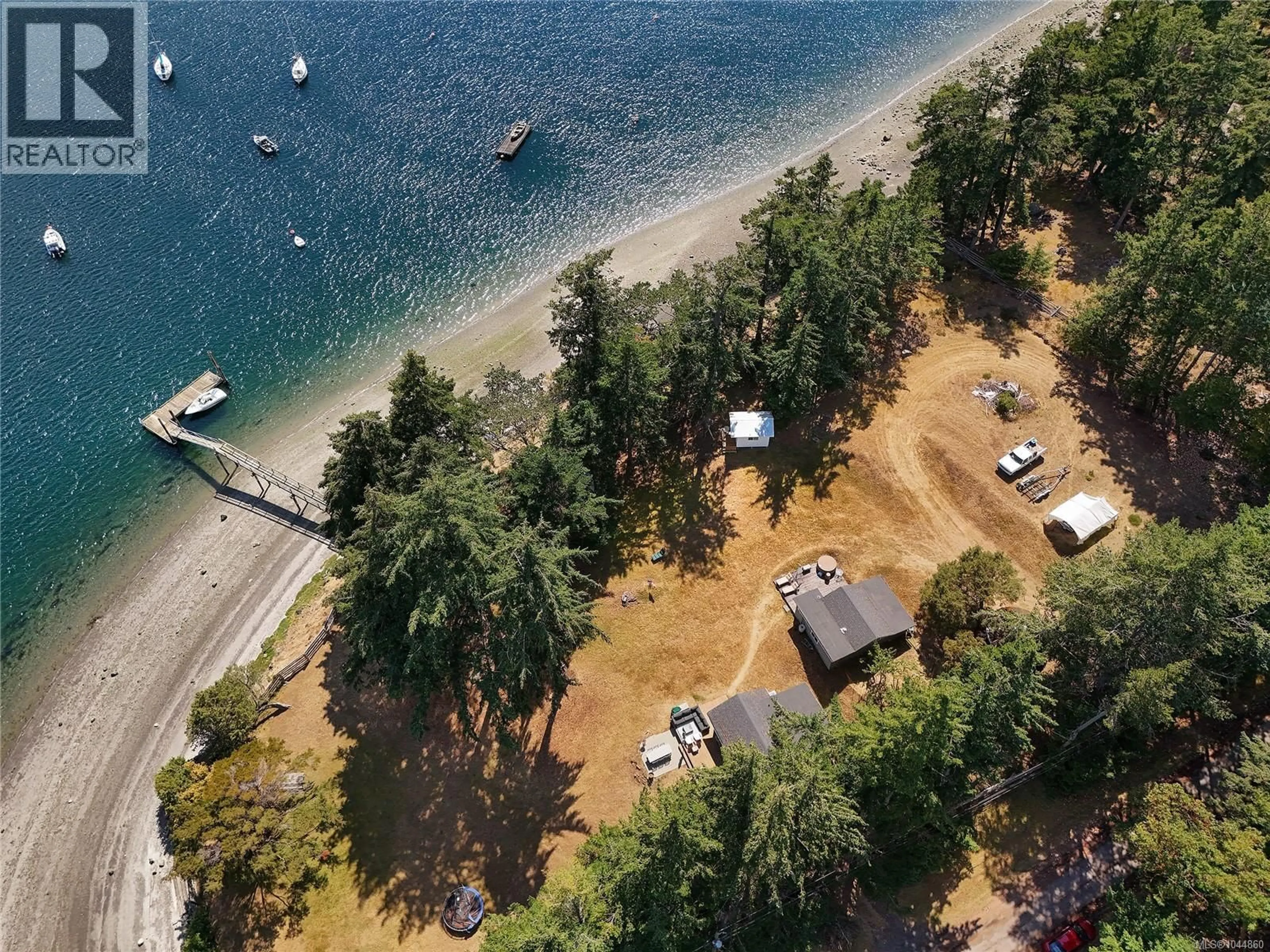 A pic from outside/outdoor area/front of a property/back of a property/a pic from drone, water/lake/river/ocean view for 774&776 STEWARD DRIVE, Mayne Island British Columbia V0N2J2