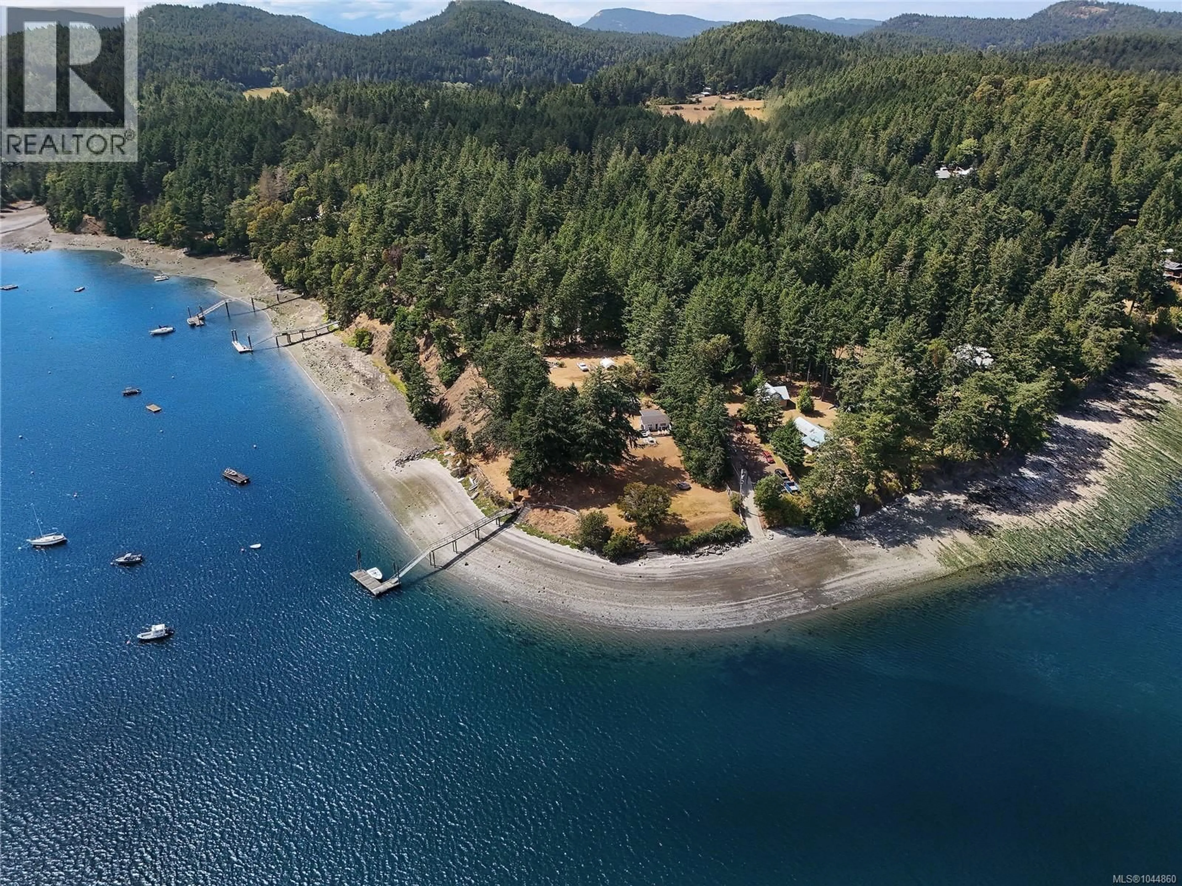 A pic from outside/outdoor area/front of a property/back of a property/a pic from drone, water/lake/river/ocean view for 774&776 STEWARD DRIVE, Mayne Island British Columbia V0N2J2