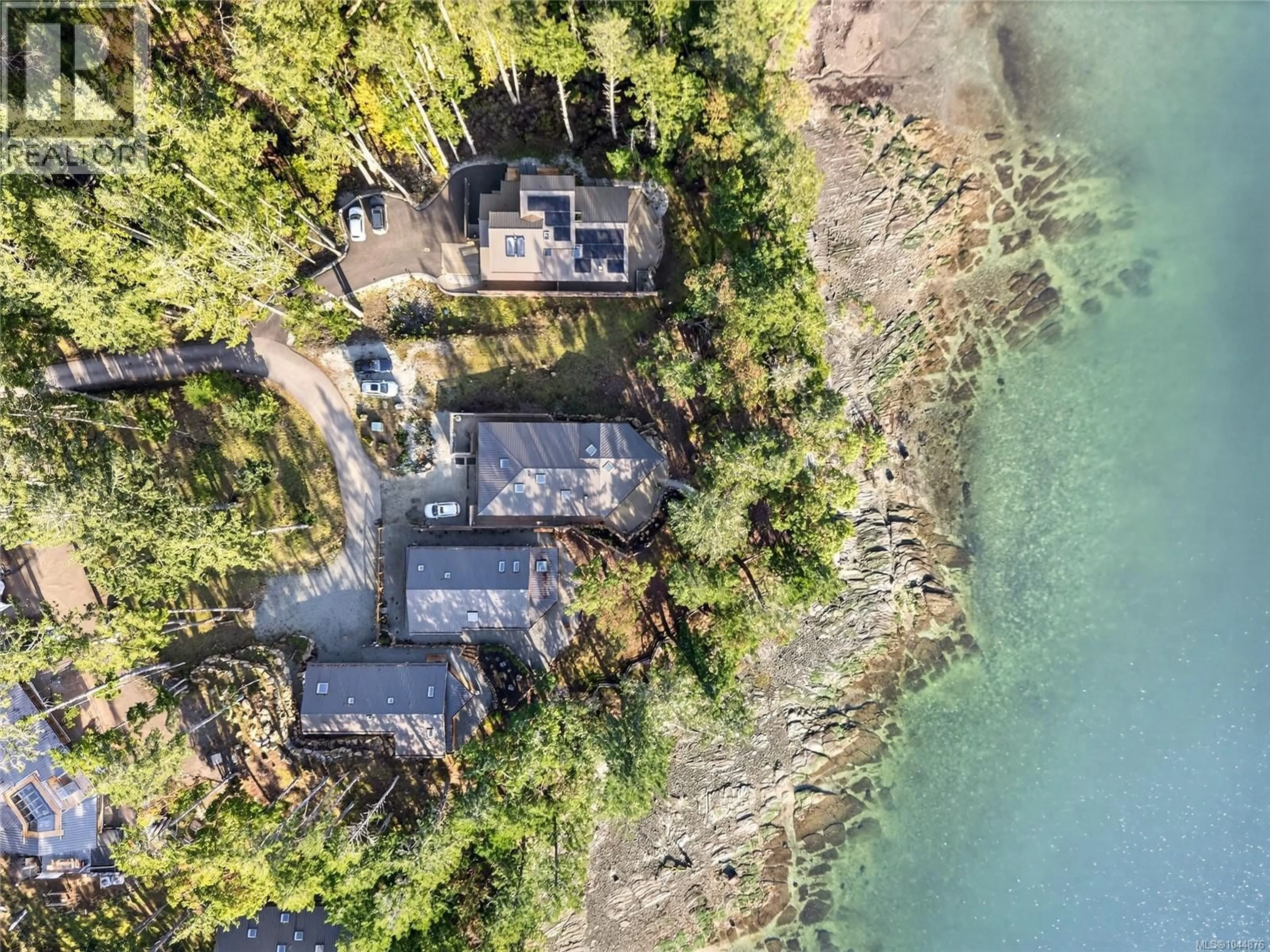 A pic from outside/outdoor area/front of a property/back of a property/a pic from drone, water/lake/river/ocean view for 177 MARACAIBO LANE, Salt Spring British Columbia V8K1S6