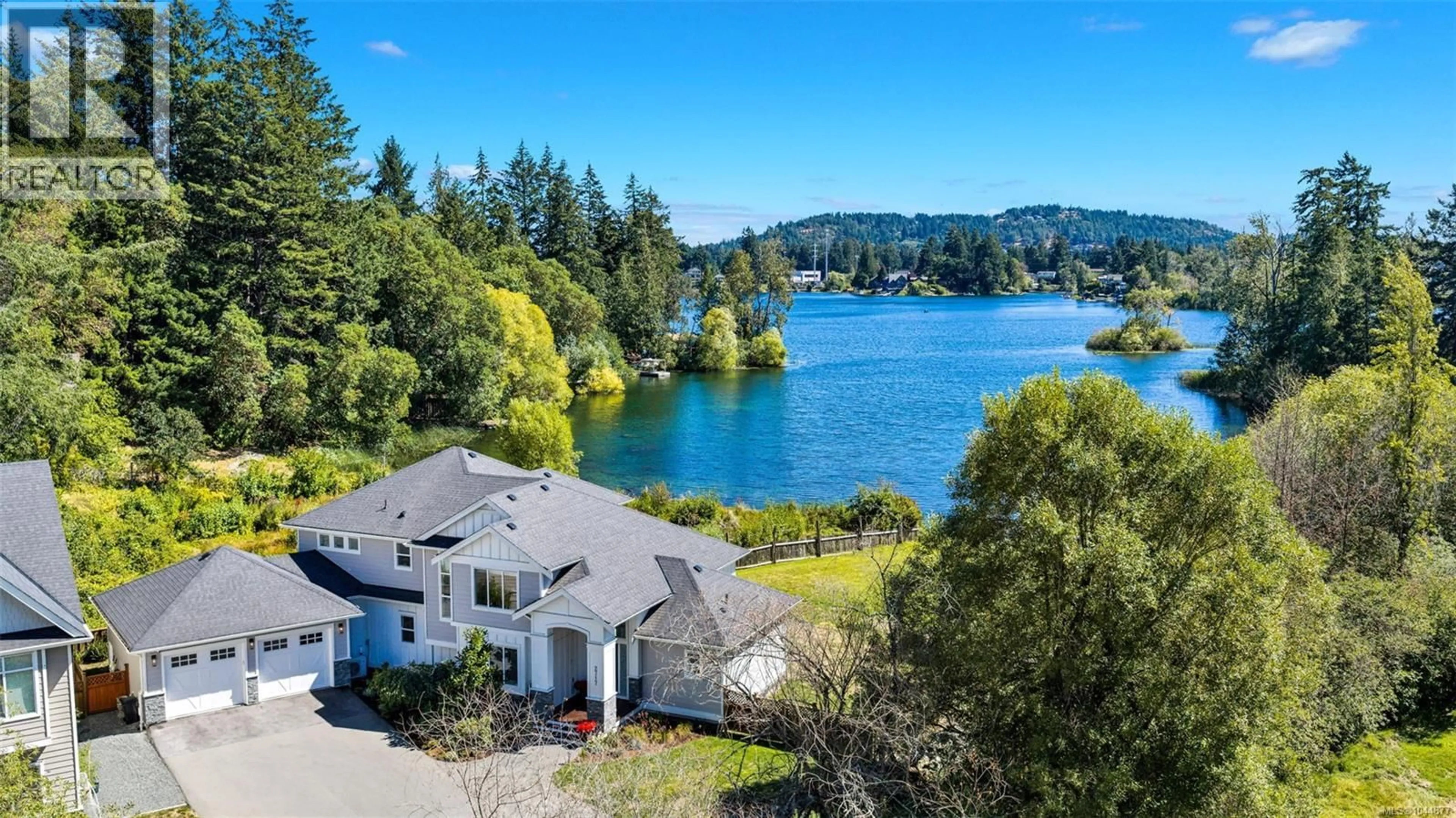 A pic from outside/outdoor area/front of a property/back of a property/a pic from drone, water/lake/river/ocean view for 2717 PANDA PLACE, Langford British Columbia V9B2Y9