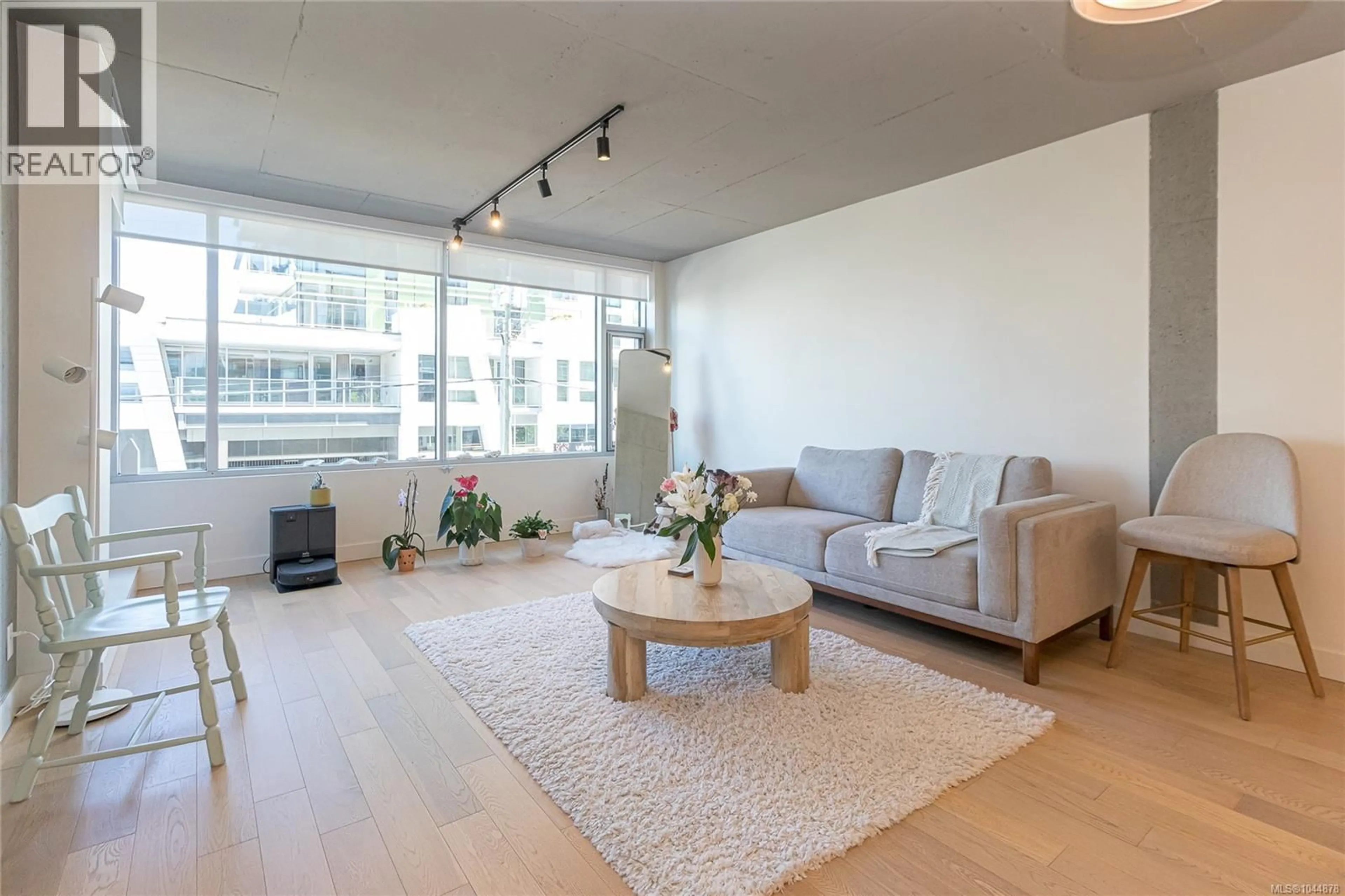 Living room with furniture, unknown for 205 - 989 JOHNSON STREET, Victoria British Columbia V8V0E3