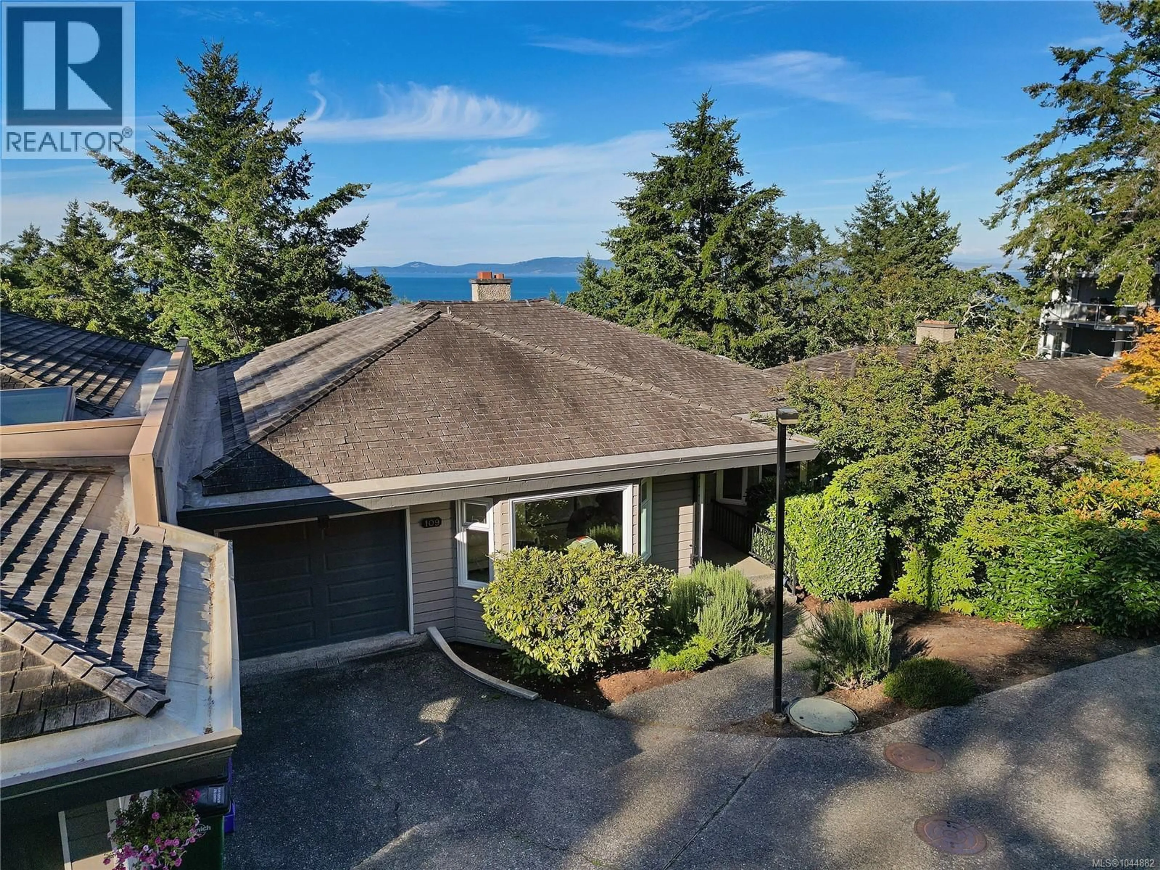 A pic from outside/outdoor area/front of a property/back of a property/a pic from drone, water/lake/river/ocean view for 109 - 2829 ARBUTUS ROAD, Saanich British Columbia V8N5X5
