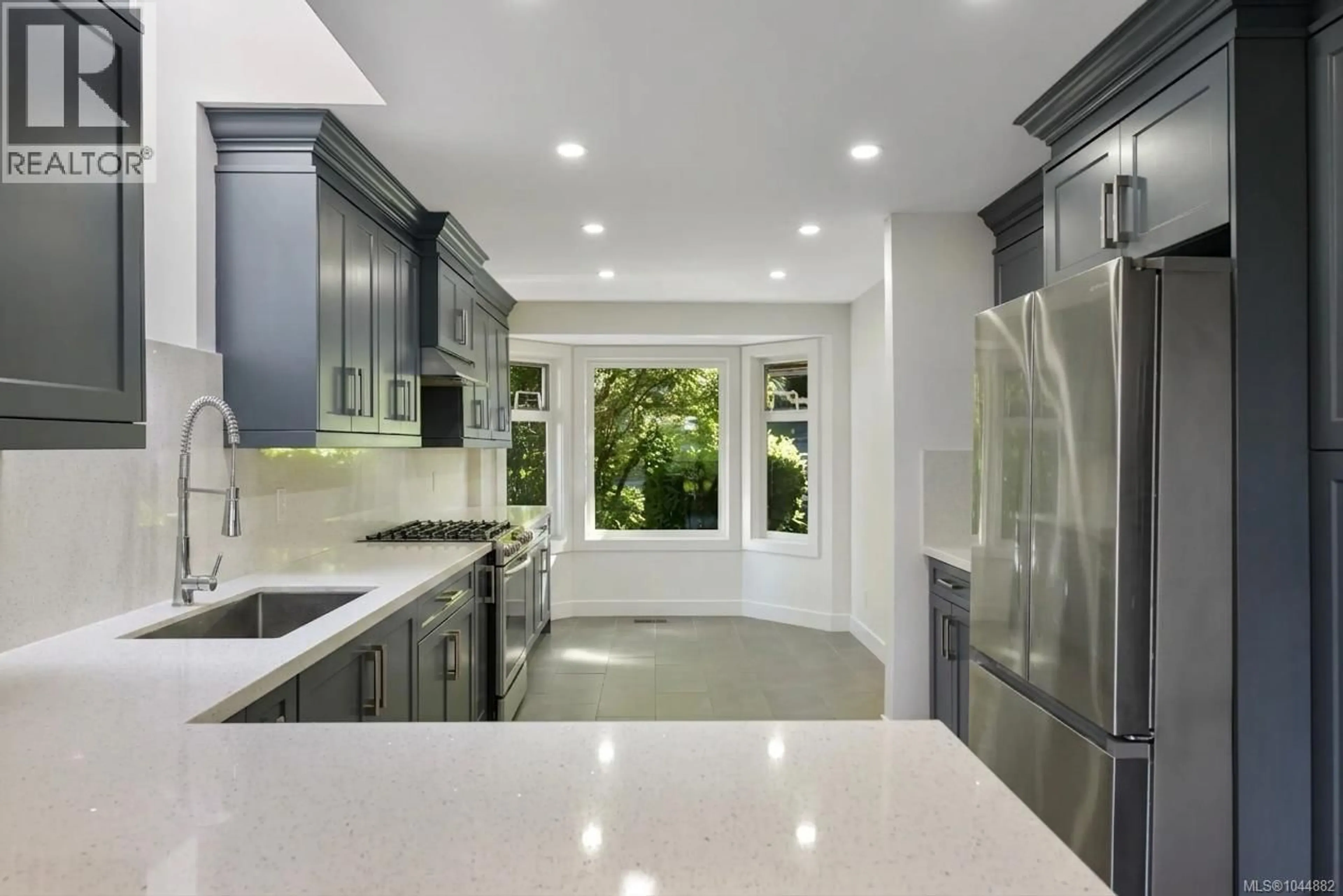 Contemporary kitchen, ceramic/tile floor for 109 - 2829 ARBUTUS ROAD, Saanich British Columbia V8N5X5