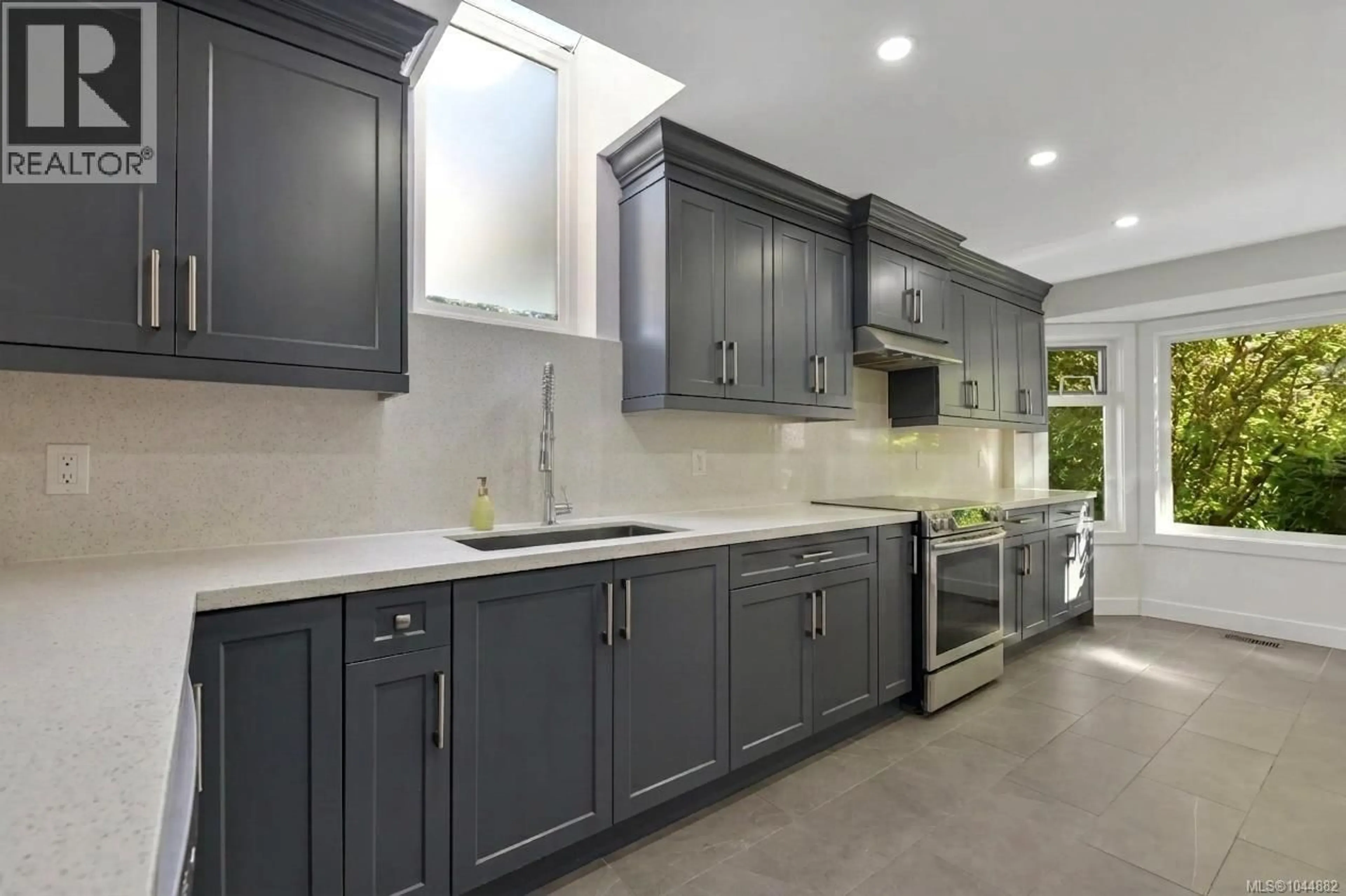 Contemporary kitchen, ceramic/tile floor for 109 - 2829 ARBUTUS ROAD, Saanich British Columbia V8N5X5