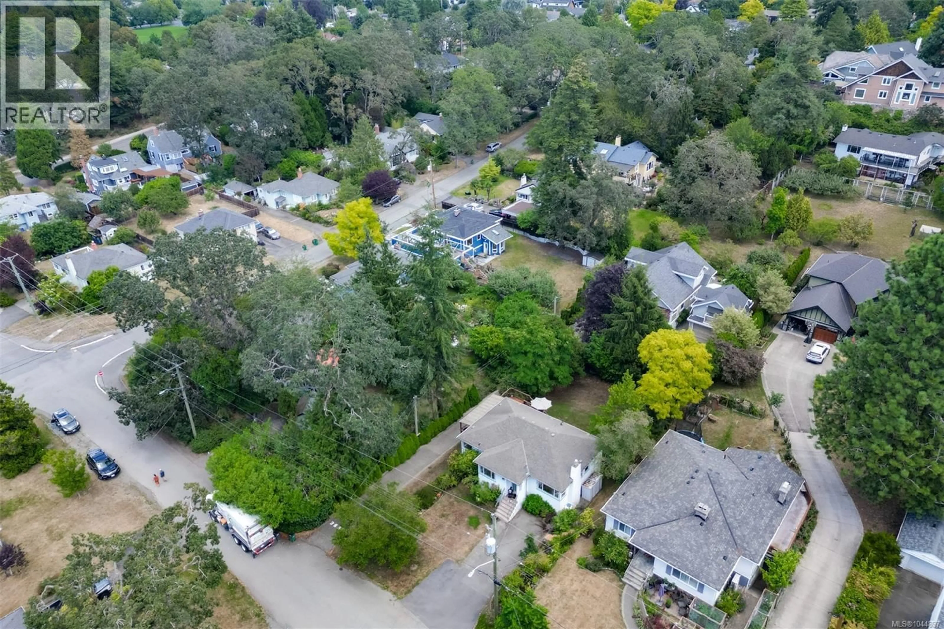 A pic from outside/outdoor area/front of a property/back of a property/a pic from drone, street for 3835 CUMBERLAND ROAD, Saanich British Columbia V8P3S1