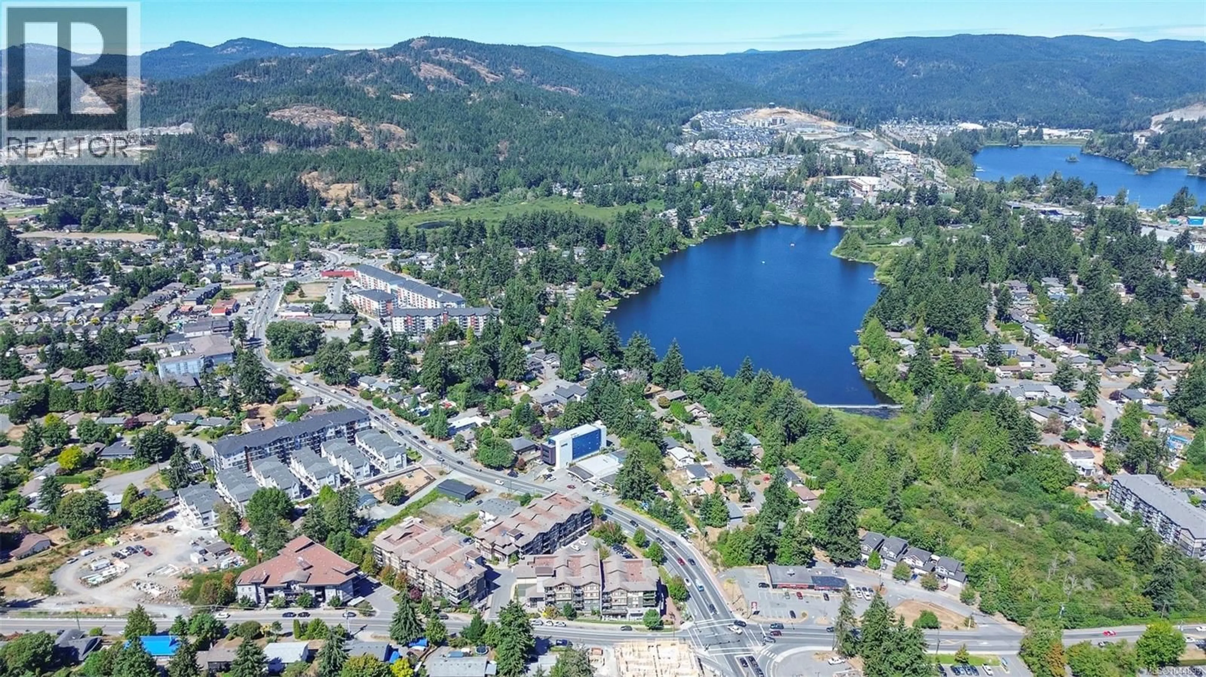 A pic from outside/outdoor area/front of a property/back of a property/a pic from drone, water/lake/river/ocean view for 402 - 3210 JACKLIN ROAD, Langford British Columbia V9B0J5