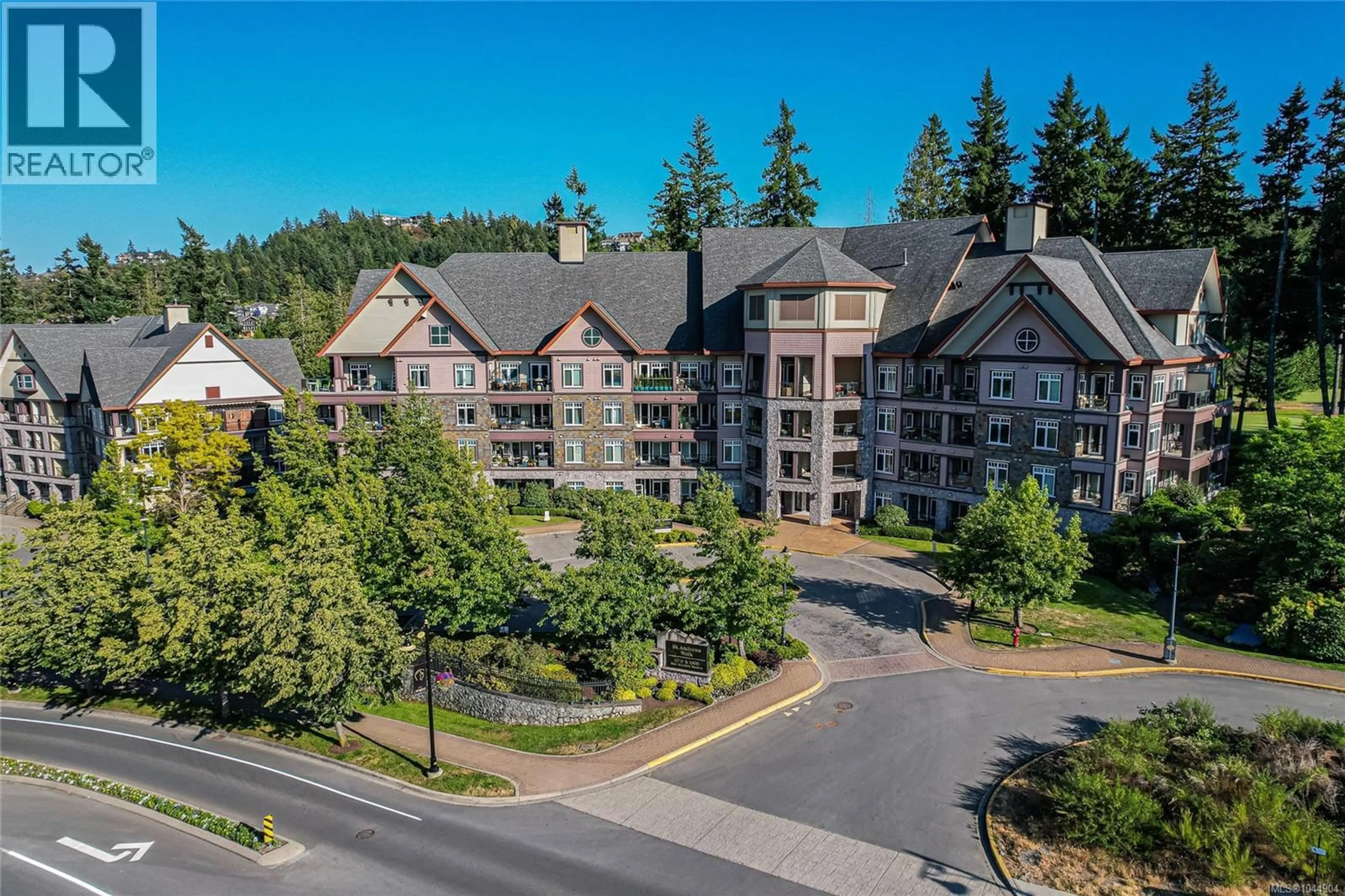 A pic from outside/outdoor area/front of a property/back of a property/a pic from drone, mountain view for 104 - 1395 BEAR MOUNTAIN PARKWAY, Langford British Columbia V9B0E1