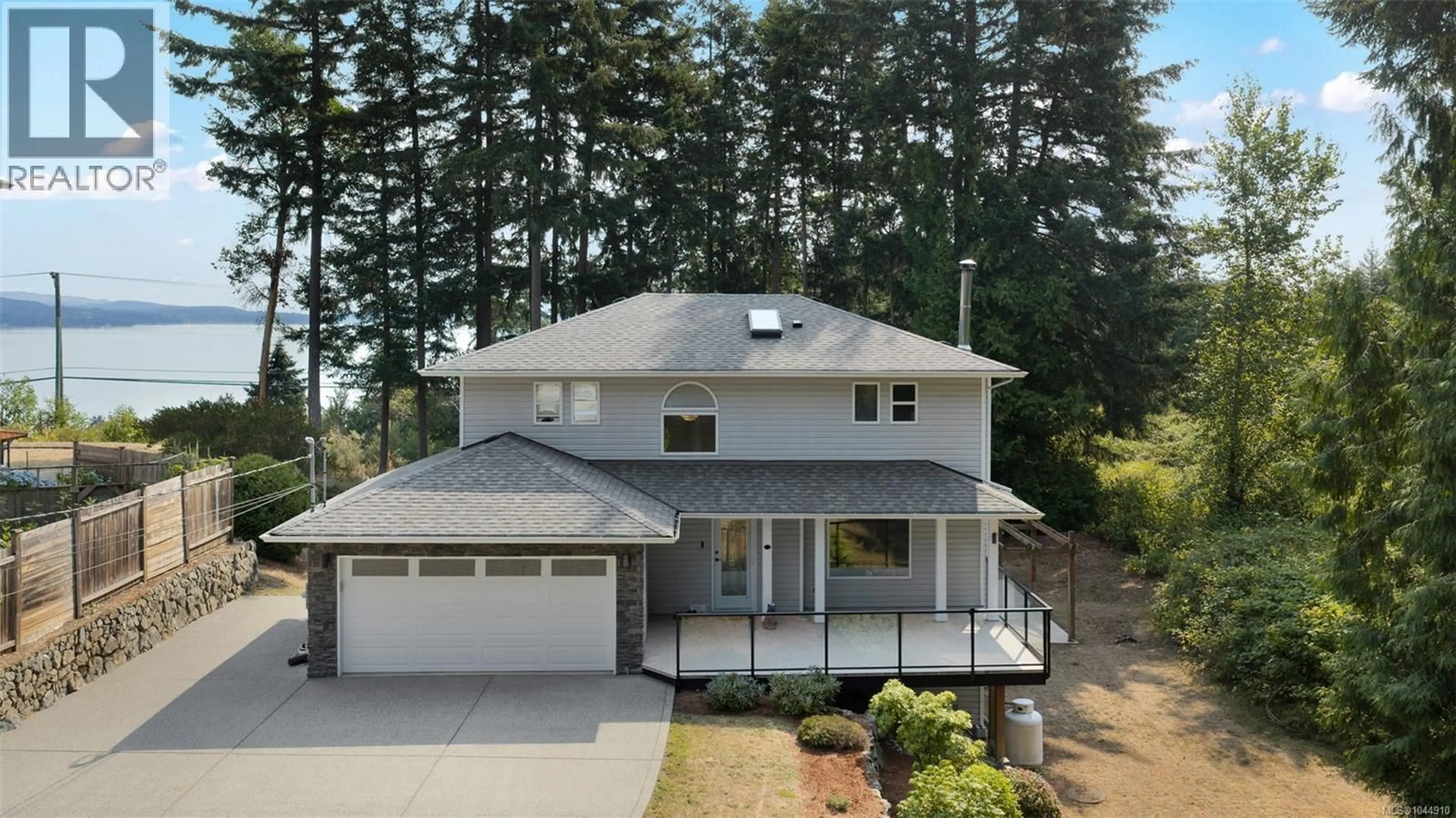 Home with vinyl exterior material, street for 2437 BENKO ROAD, Mill Bay British Columbia V0R2P4