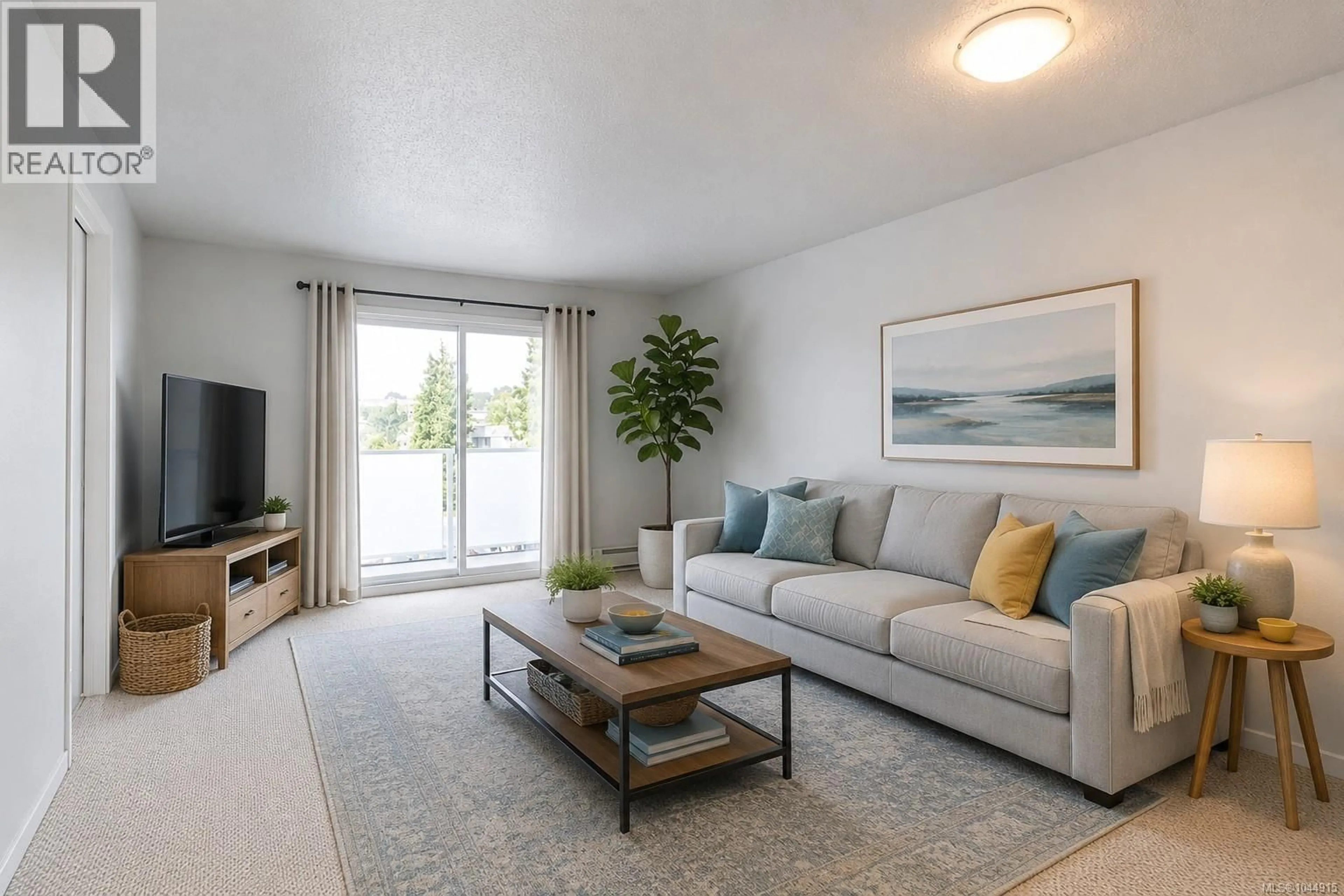 Living room with furniture, unknown for 203 - 3240 GLASGOW AVENUE, Saanich British Columbia V8X1M2