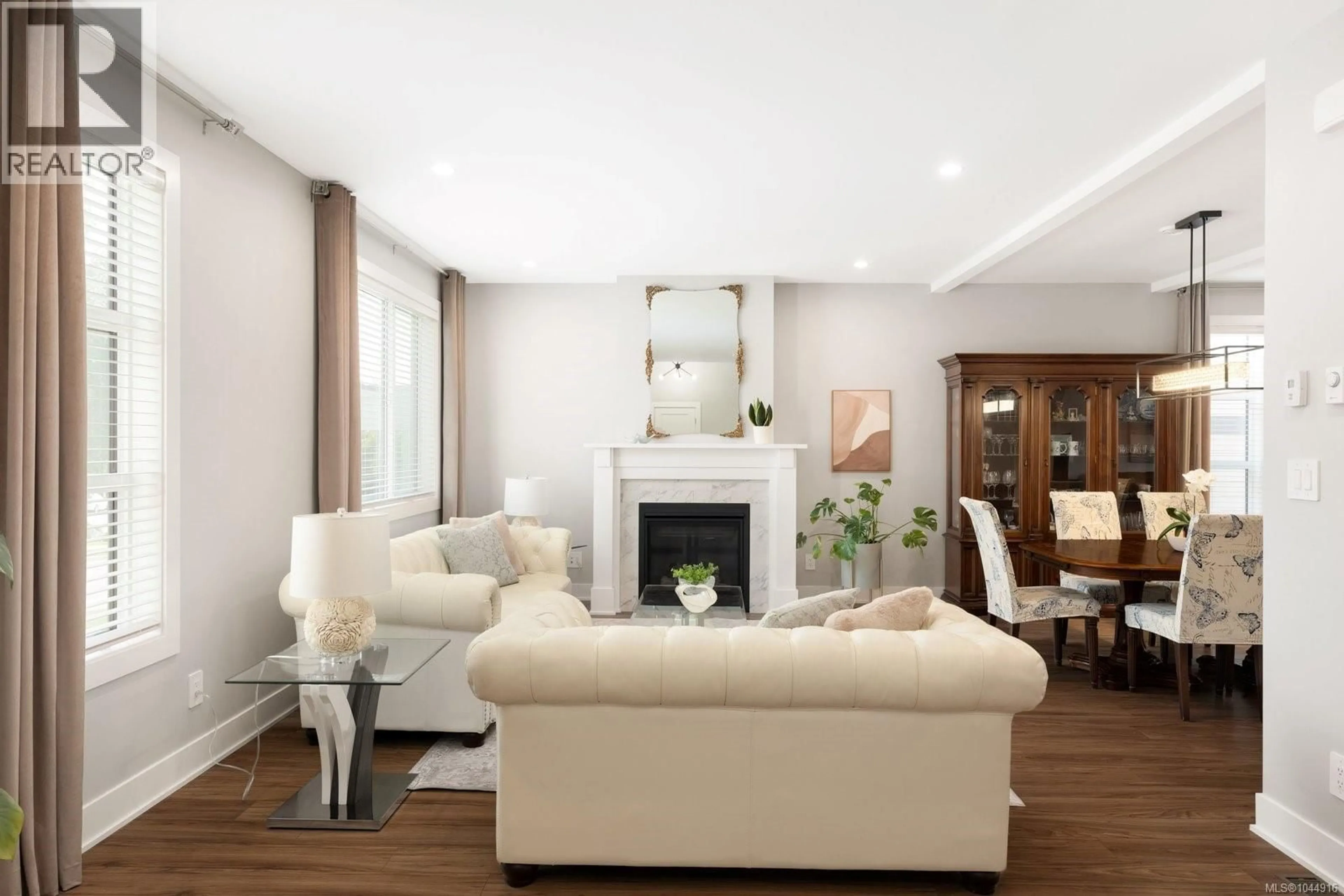Living room with furniture, wood/laminate floor for 2939 CONSTELLATION AVENUE, Langford British Columbia V9B6Z7