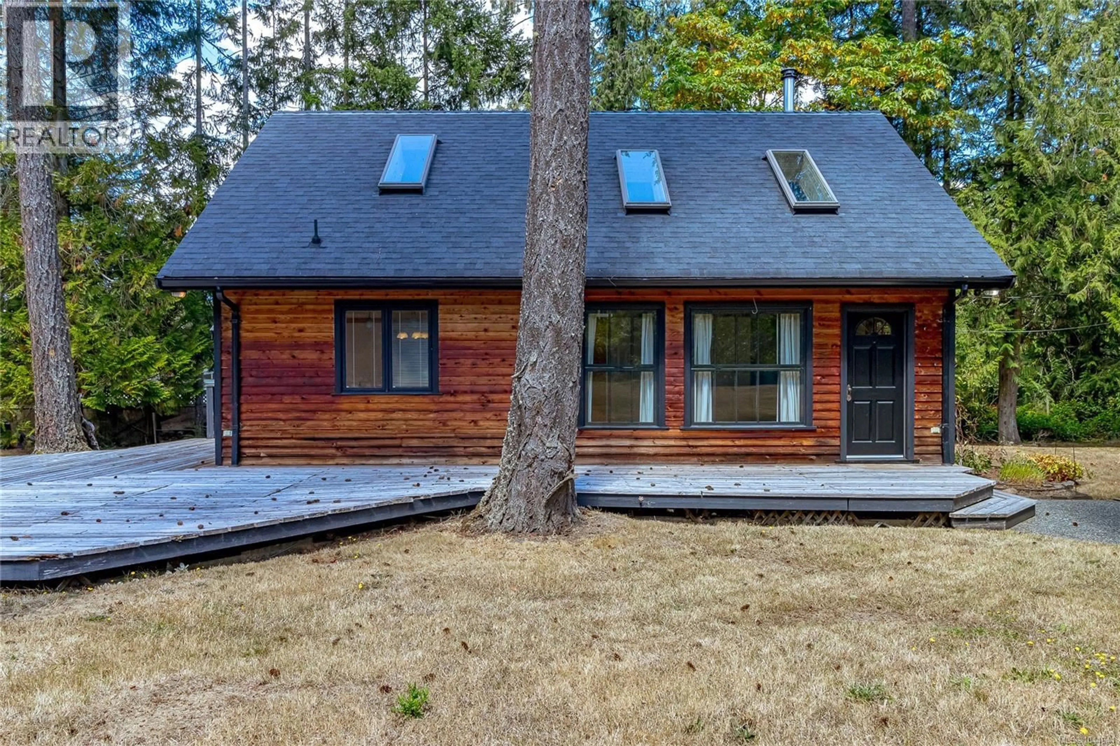 Home with brick exterior material, forest/trees view for 649 WOODCREEK DRIVE, North Saanich British Columbia V8L5K5