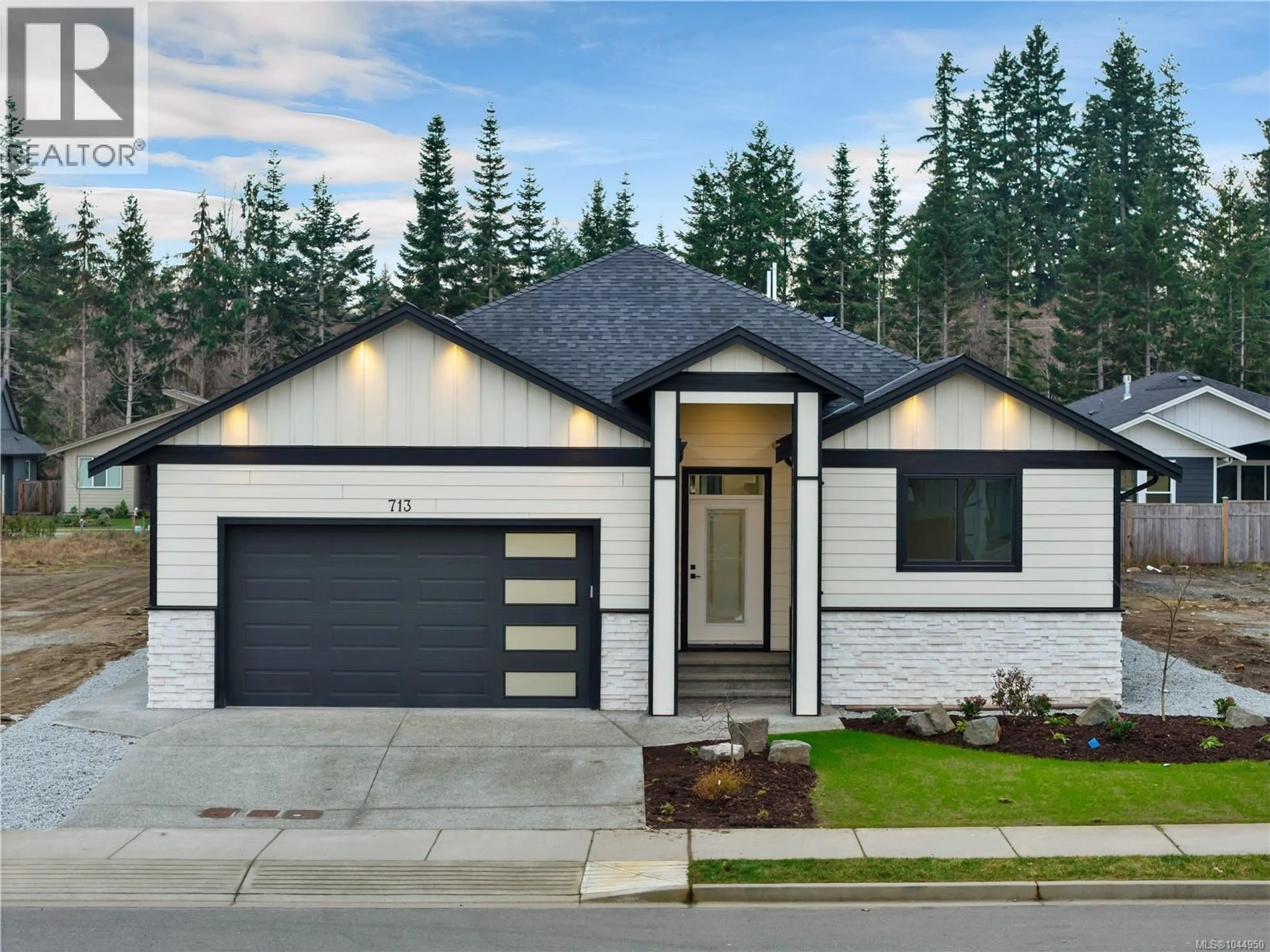 Home with brick exterior material, street for 713 BEAVER CREEK BOULEVARD, Campbell River British Columbia V9W0B6