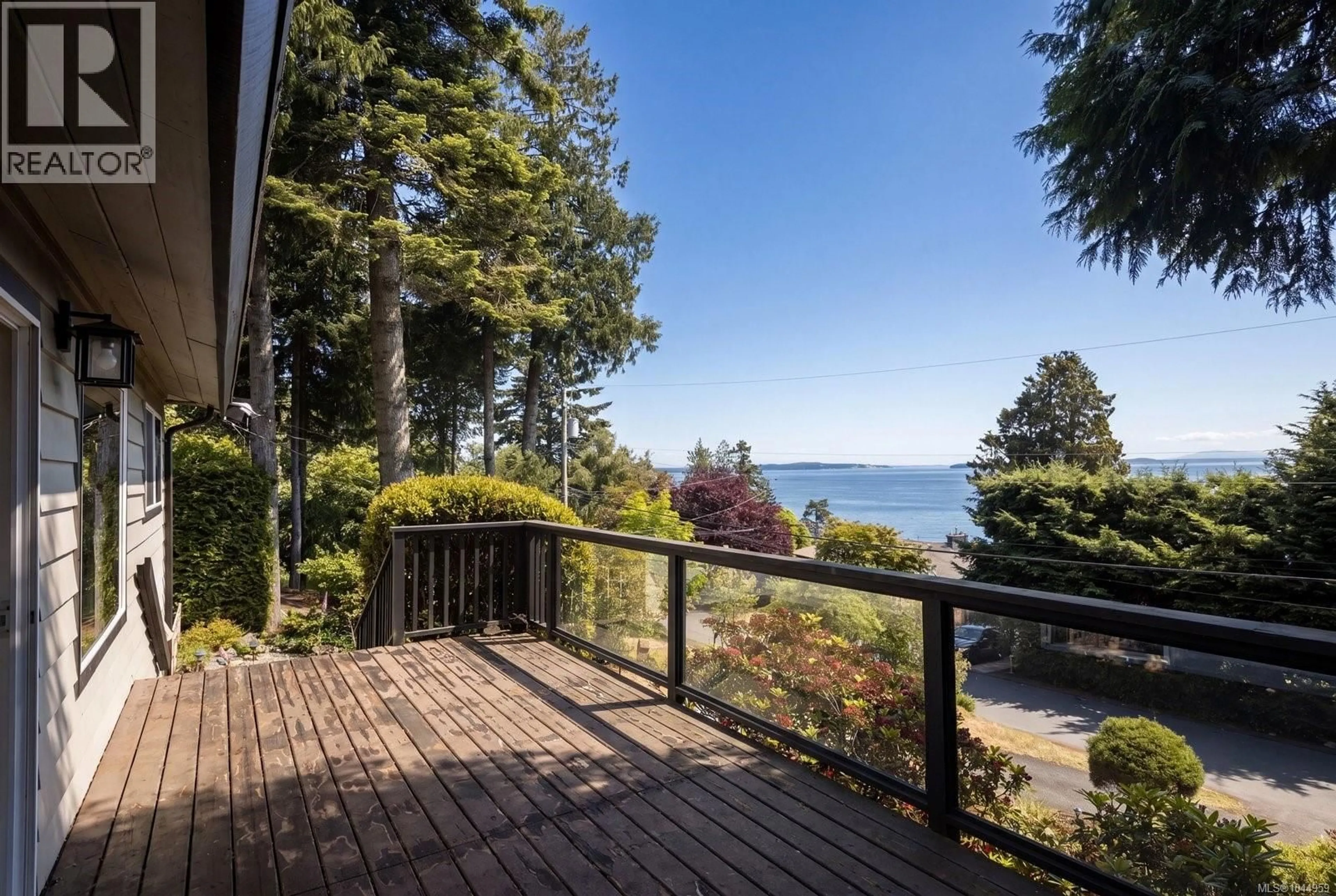 Patio, water/lake/river/ocean view for 4950 LOCHSIDE DRIVE, Saanich British Columbia V8Y2E4