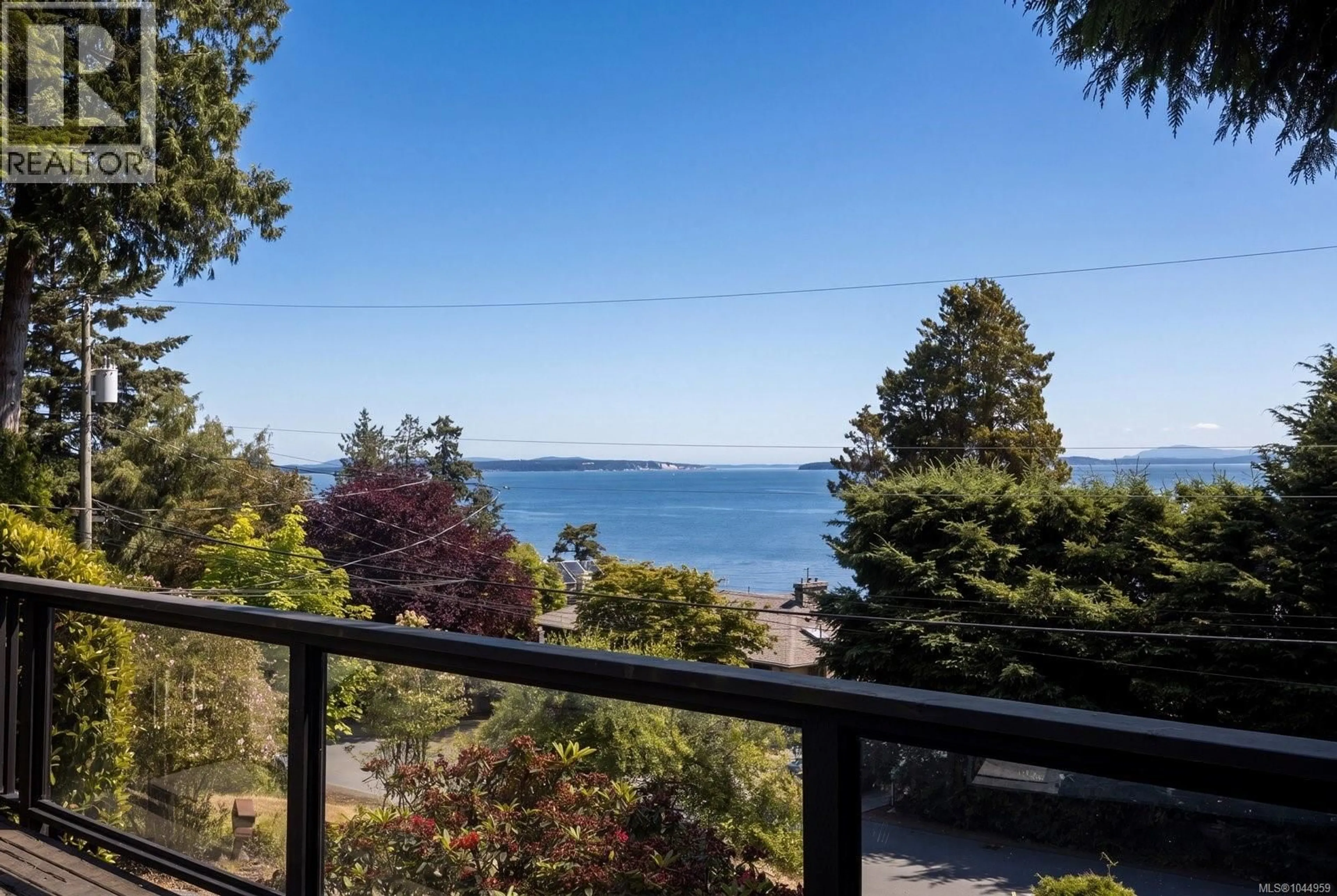 Patio, water/lake/river/ocean view for 4950 LOCHSIDE DRIVE, Saanich British Columbia V8Y2E4