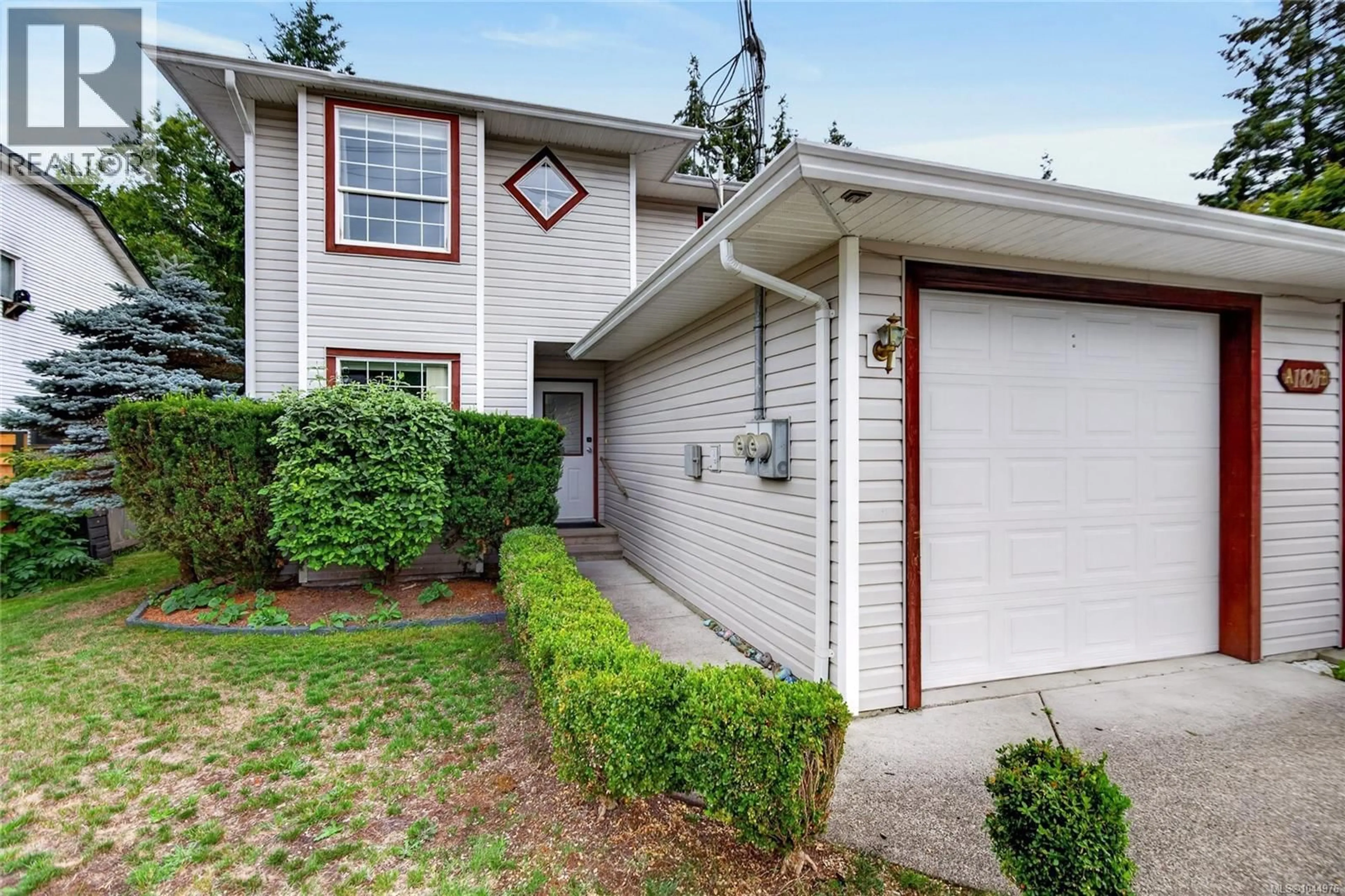 Home with vinyl exterior material, street for A - 1820 1ST STREET, Courtenay British Columbia V9N6V5