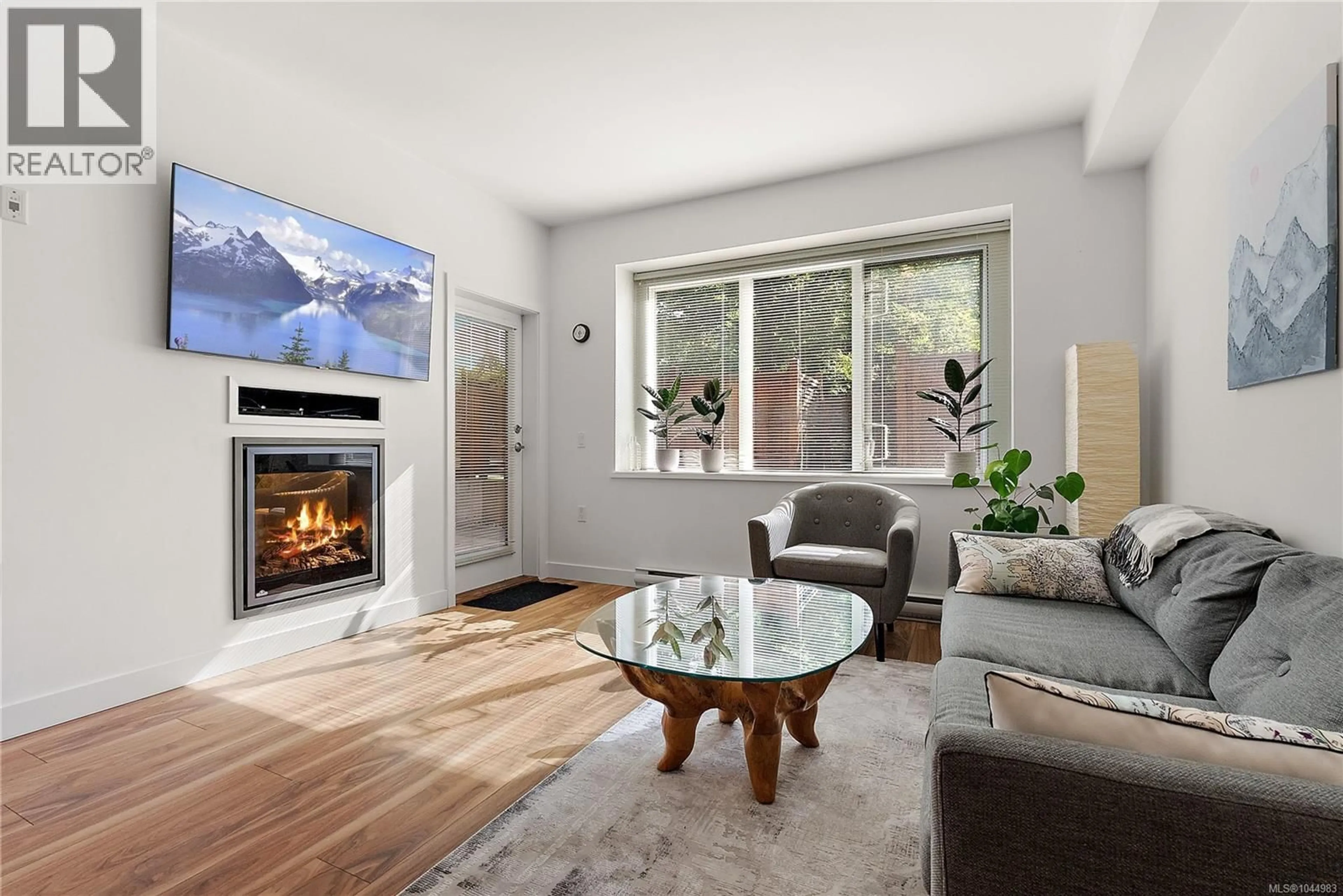 Living room with furniture, unknown for 102 - 4030 BORDEN STREET, Saanich British Columbia V8X2E9