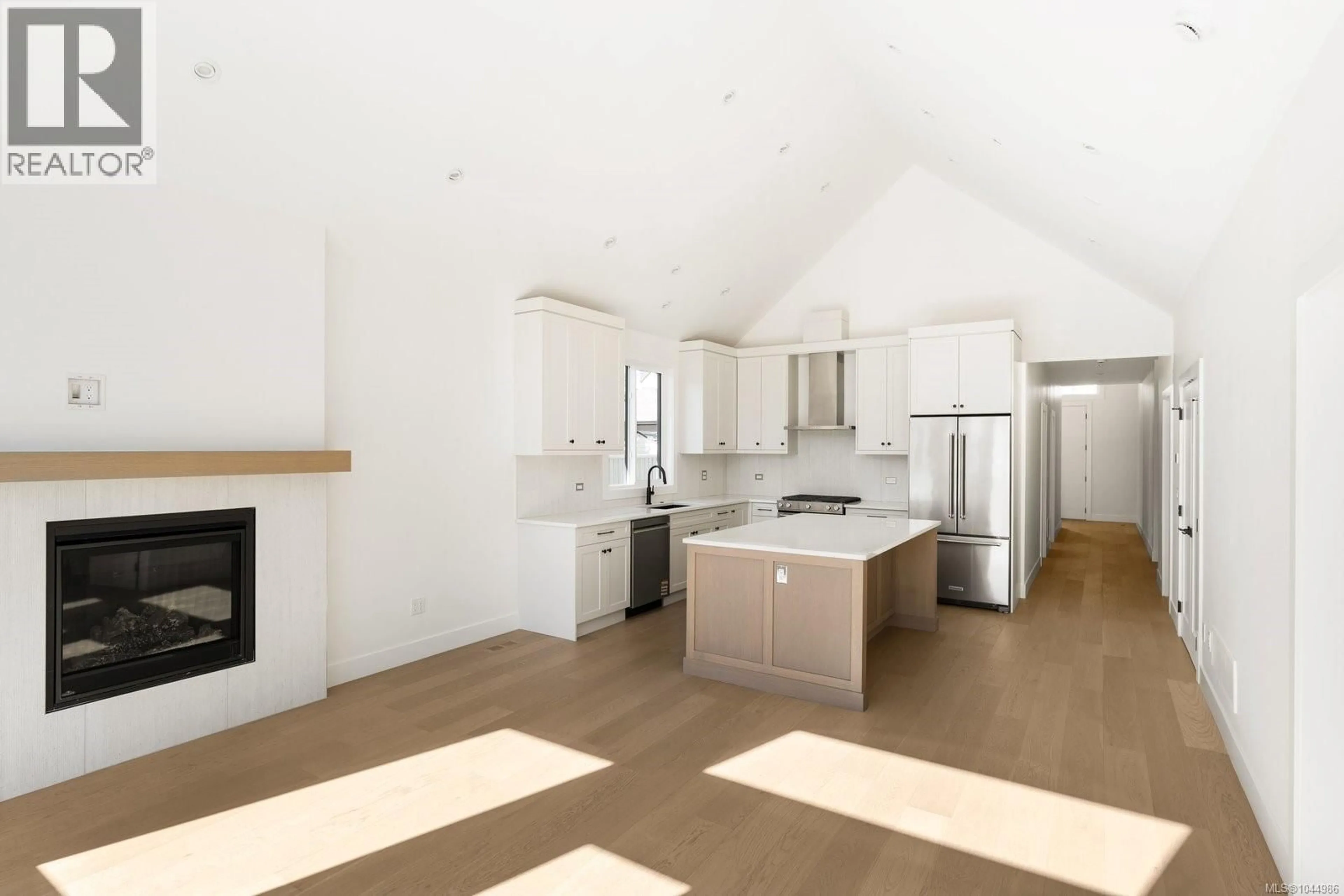 Open concept kitchen, wood/laminate floor for 10011 CHICORY PLACE, Sidney British Columbia V8L3N6