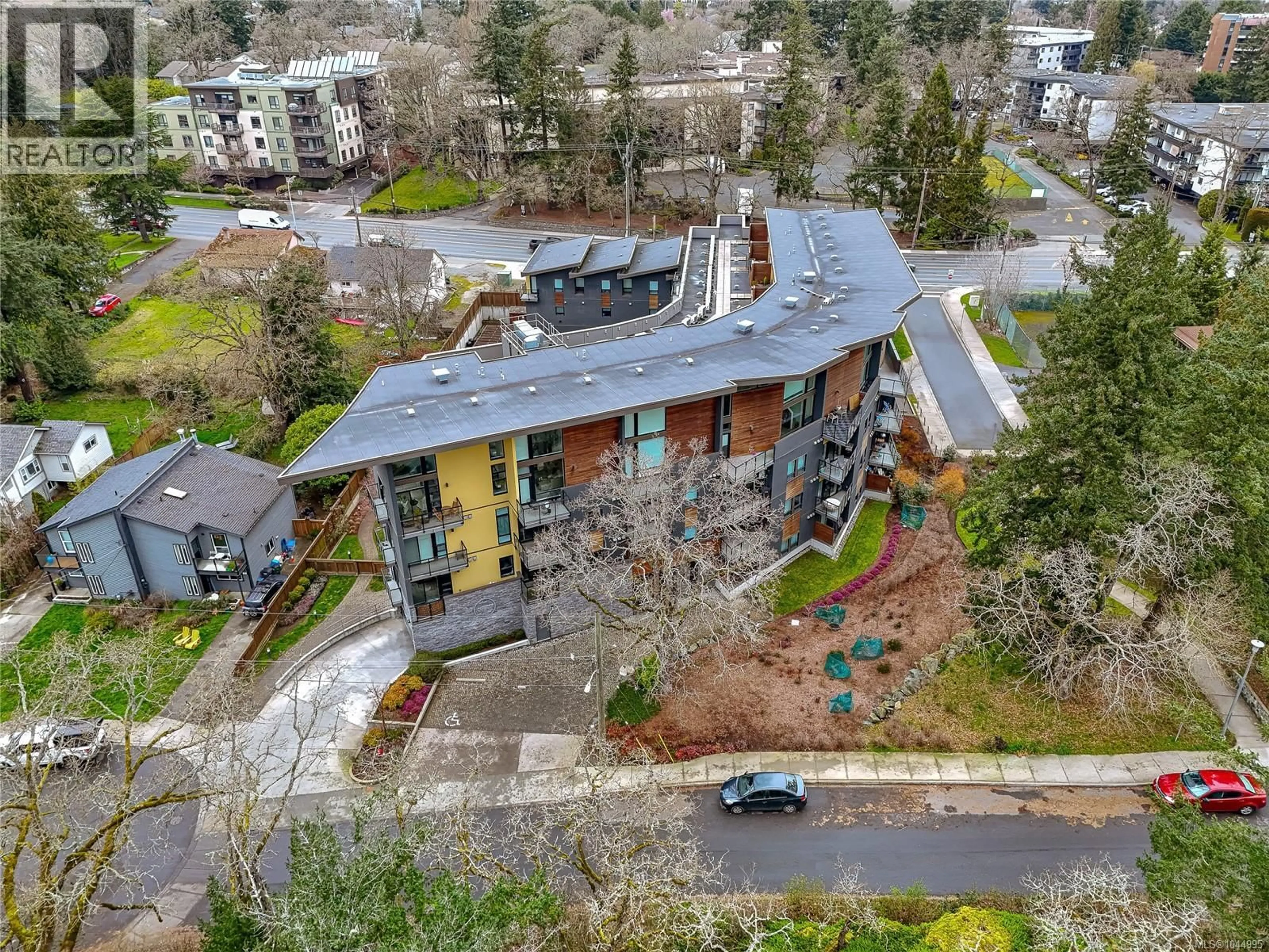 A pic from outside/outdoor area/front of a property/back of a property/a pic from drone, unknown for 312 - 991 MCKENZIE AVENUE, Saanich British Columbia V8X0B5