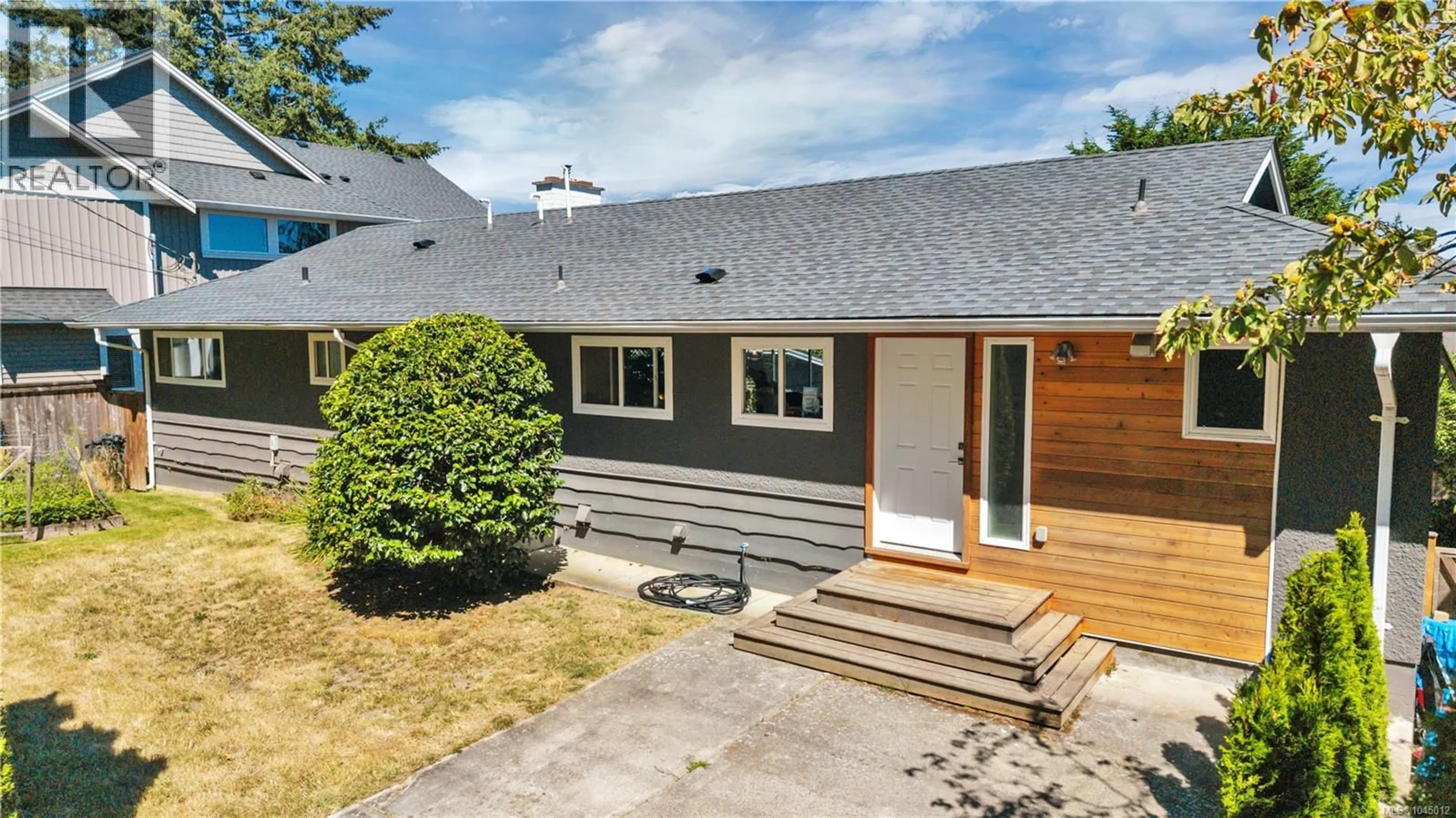 A pic from outside/outdoor area/front of a property/back of a property/a pic from drone, street for 5620 HAMMOND BAY ROAD, Nanaimo British Columbia V9T5N2